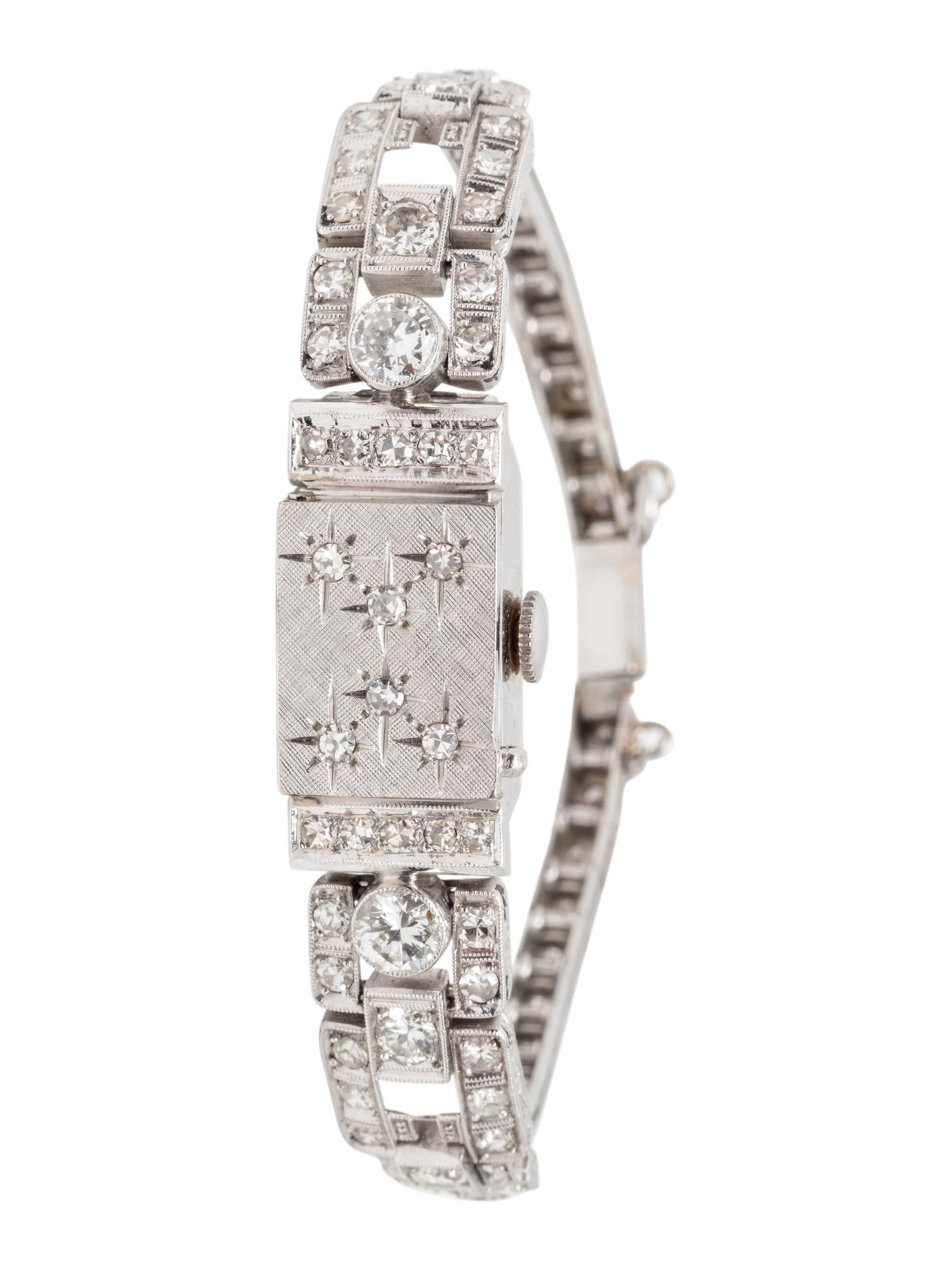 GENÈVE, WHITE GOLD AND DIAMOND SURPRISE WATCH