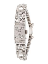 GENÈVE, WHITE GOLD AND DIAMOND SURPRISE WATCH