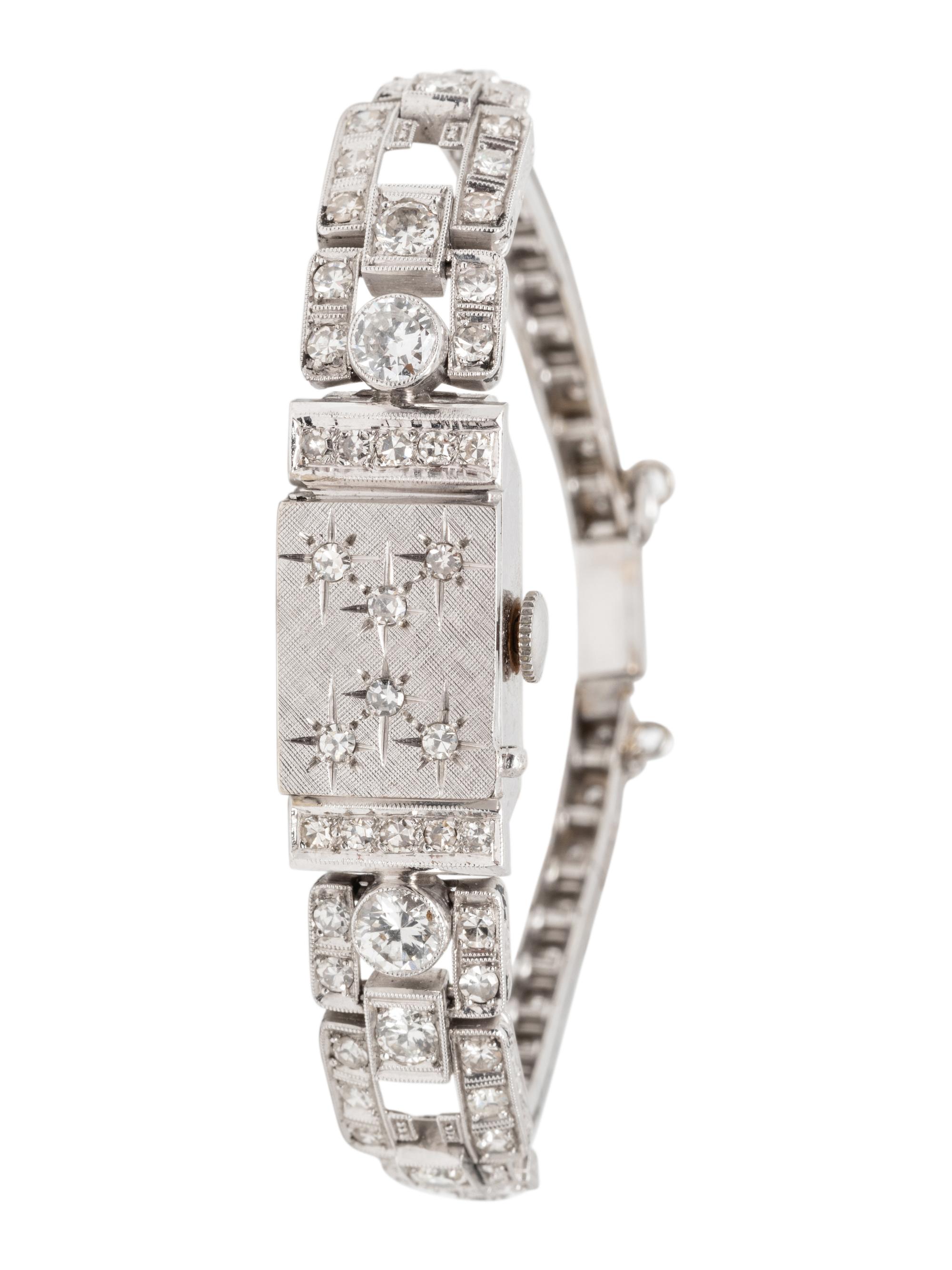 GENÈVE, WHITE GOLD AND DIAMOND SURPRISE WATCH