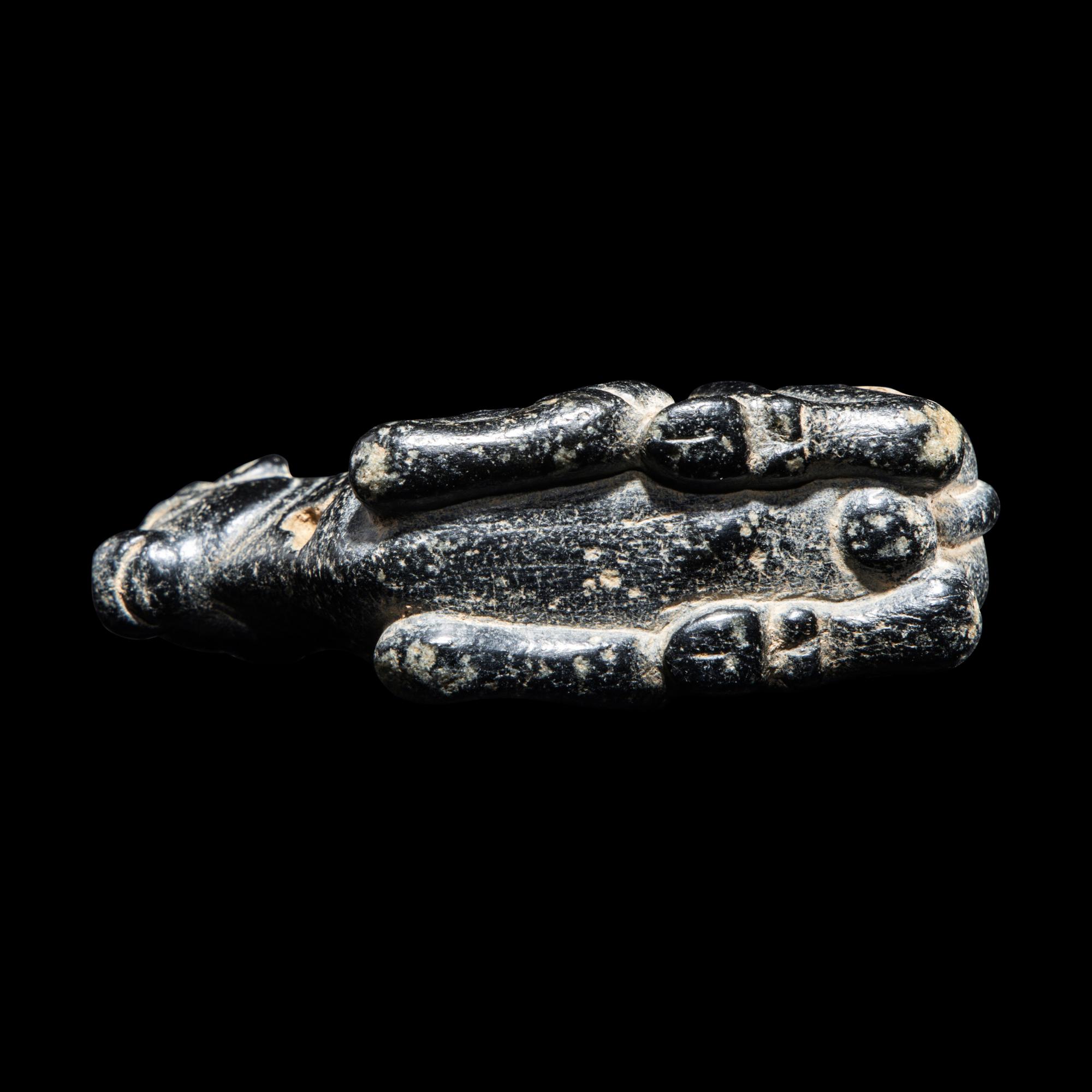A Mesopotamian Marble and Limestone Inlay Recumbent Calf