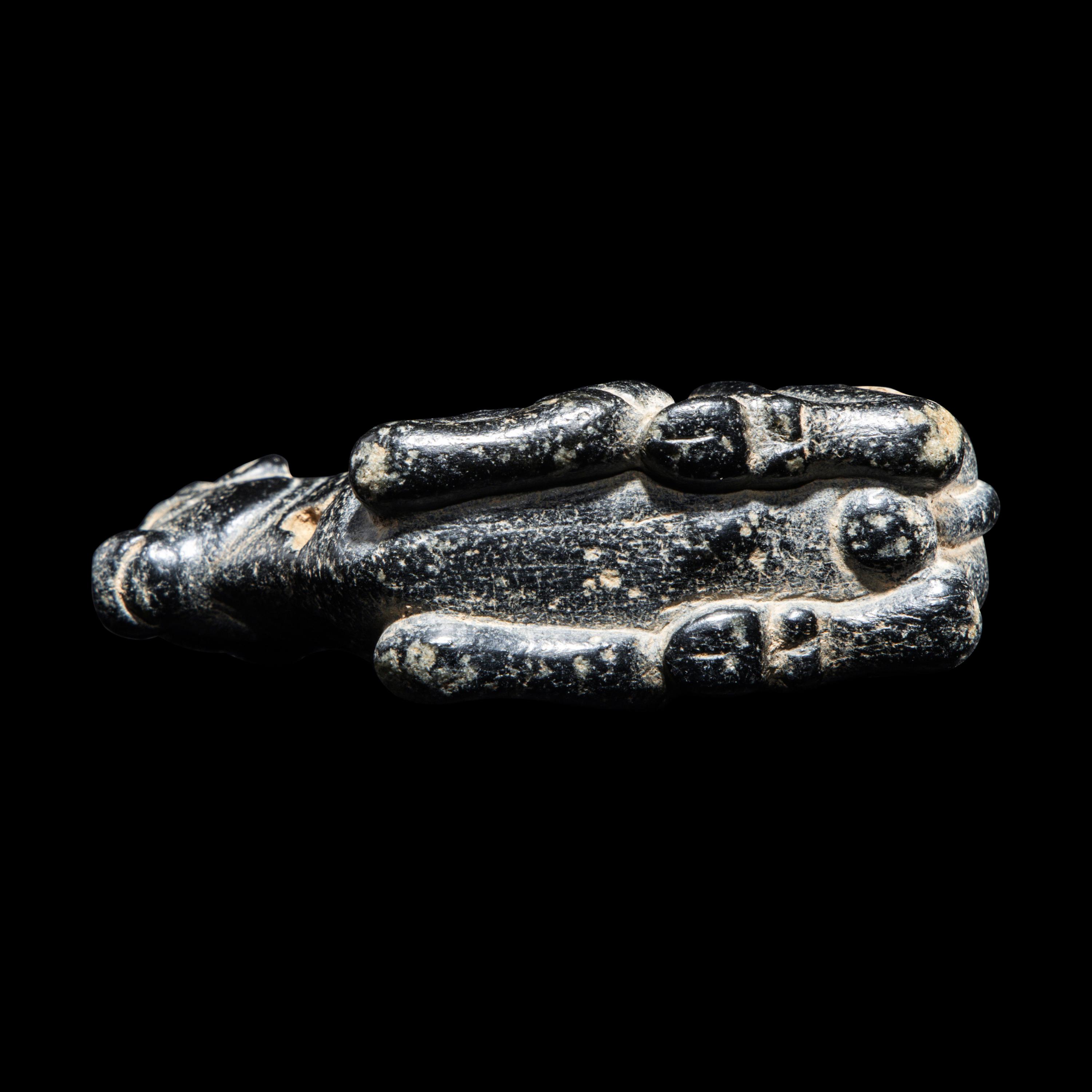 A Mesopotamian Marble and Limestone Inlay Recumbent Calf