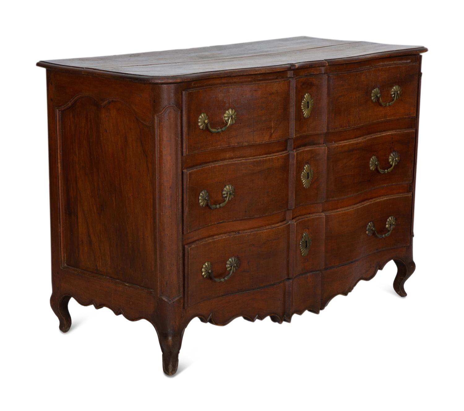 A French Provincial Carved Walnut Commode