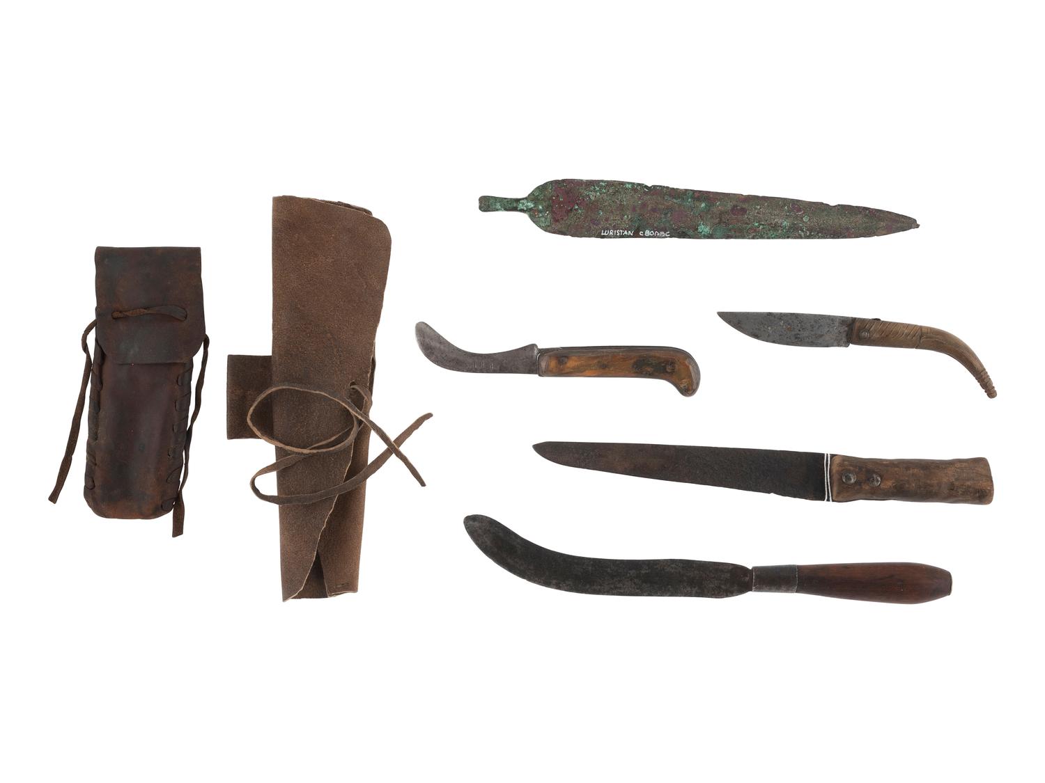 [NATIVE AMERICANS - RELICS]. Group of excavated tomahawks, strikers, and other edged weapons.