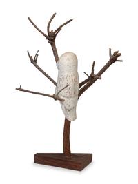 A Folk Art Carving of a Snowy Owl Perched in Tree