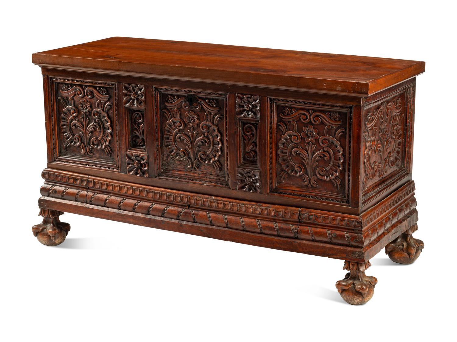A Continental Carved Walnut Coffer