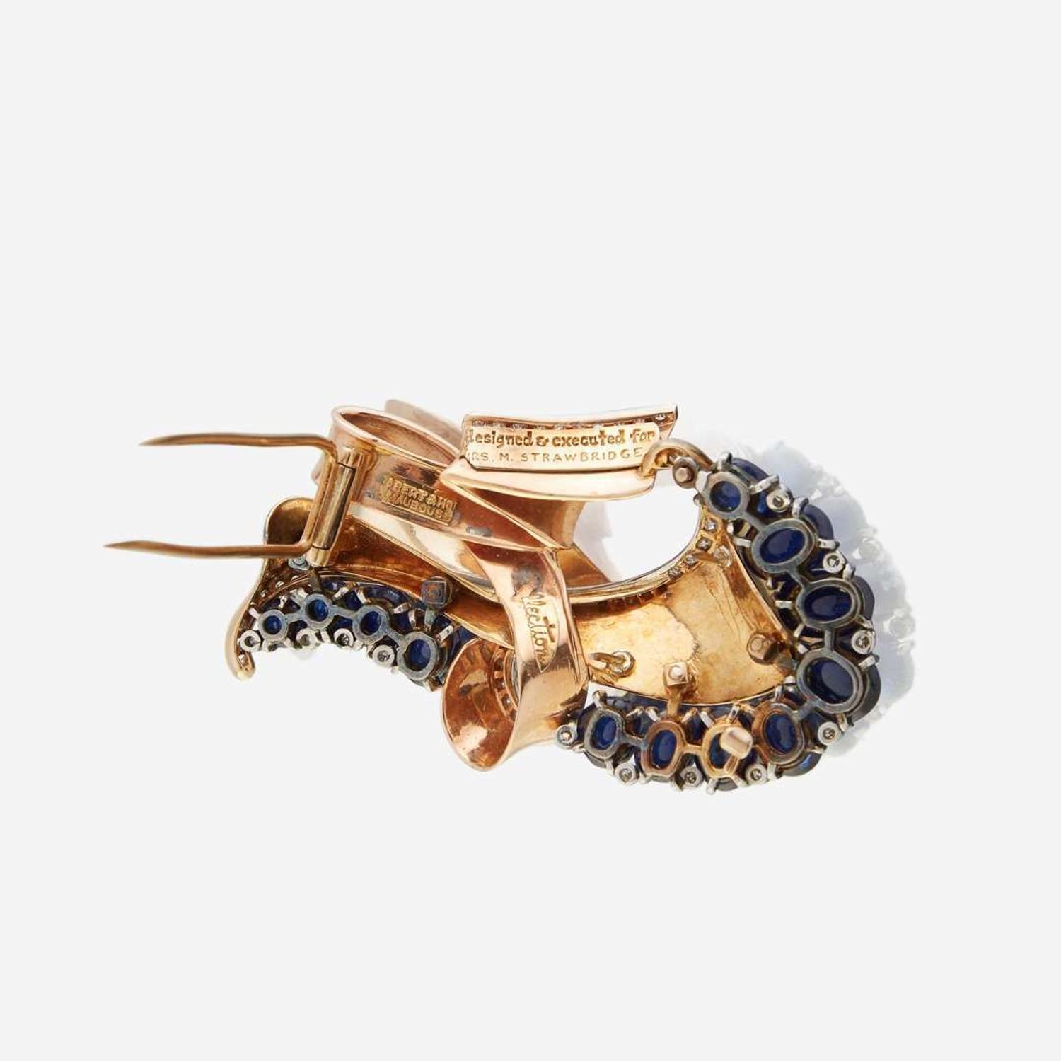 A Retro sapphire, diamond, and fourteen karat gold brooch circa 1940s