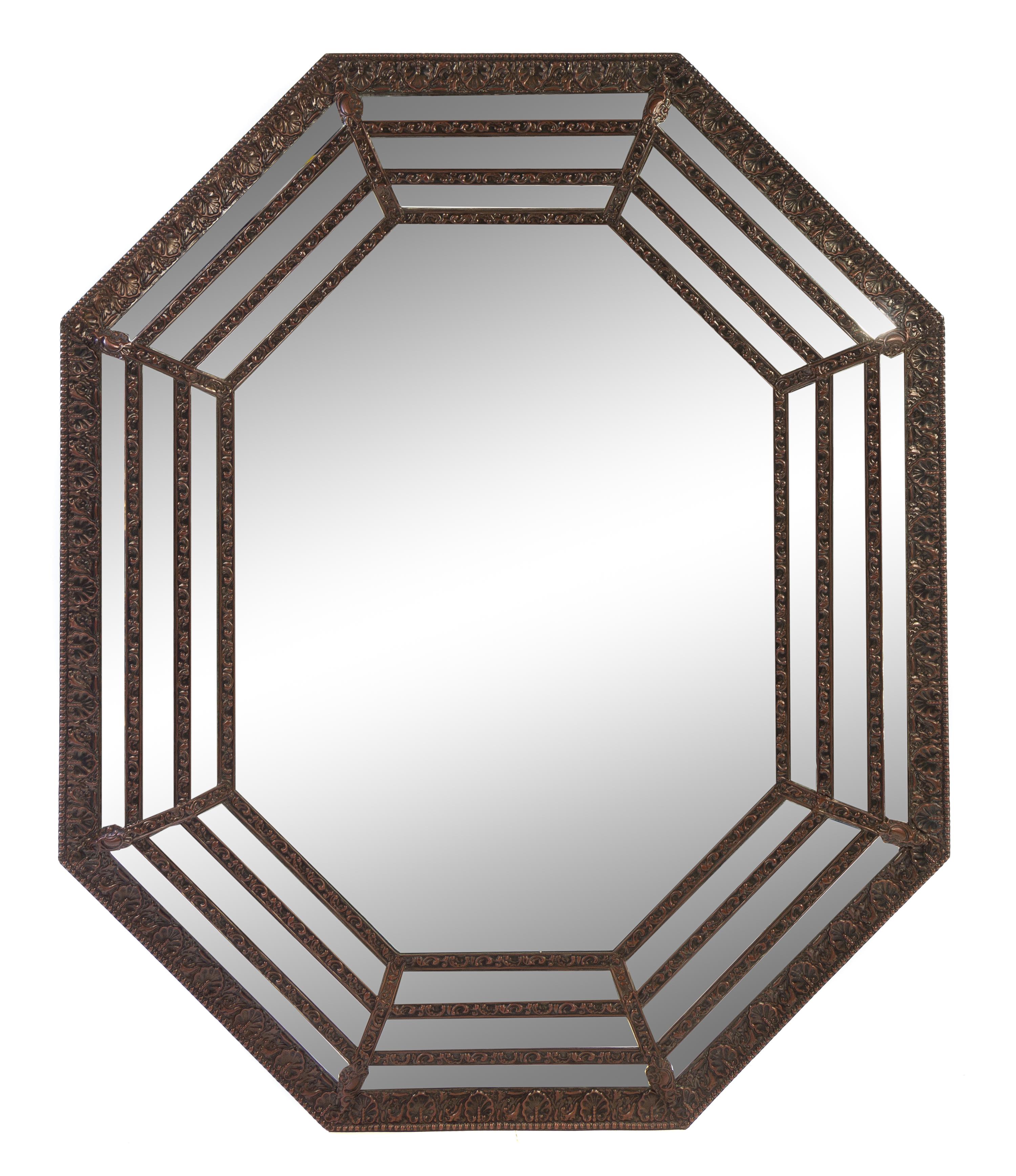 A Dutch Baroque Style Pressed Brass Mirror Height 60 x width 49 1/2 inches. — 20TH CENTURY