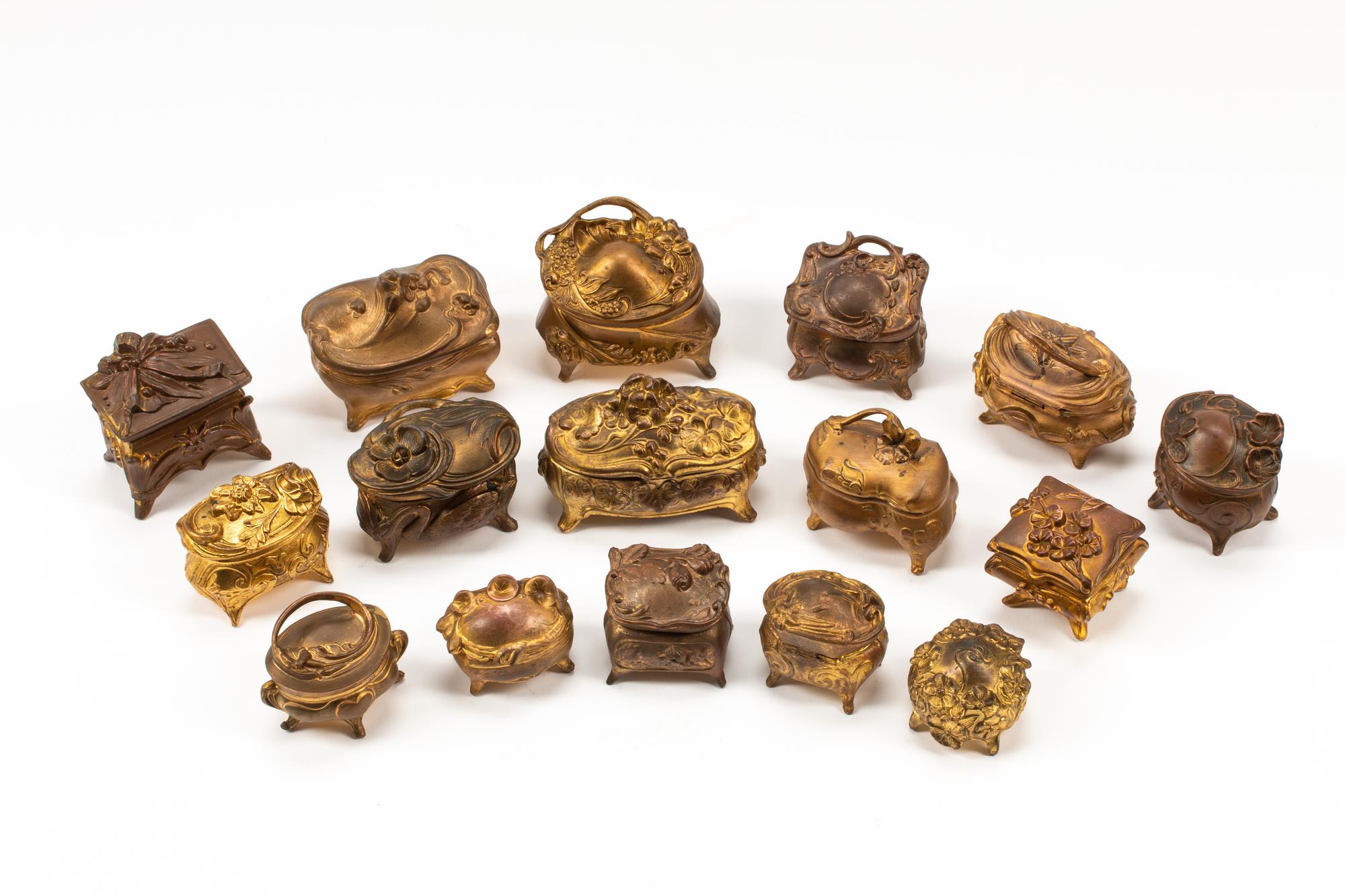A Collection of Sixteen French Bronze and Metal Small Boxes