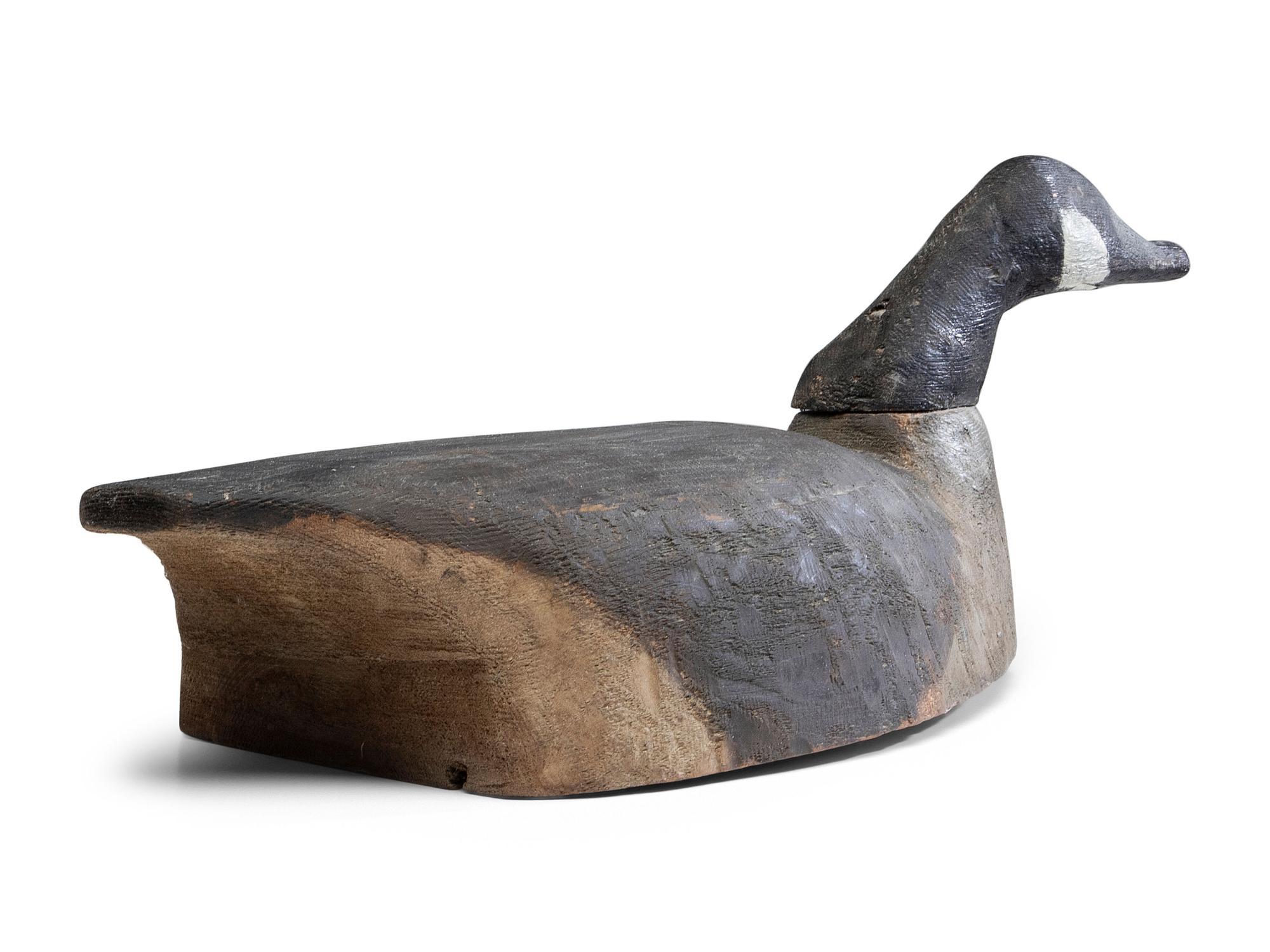A Carved and Painted White Pine Canadian Goose Decoy