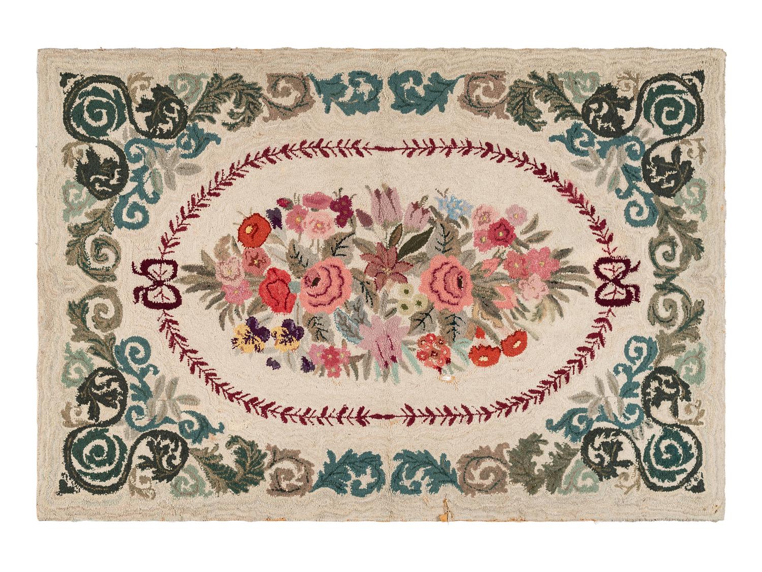 A Large Cotton Floral Spray and Acanthus Scroll Decorated Hooked Rug