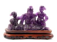 Two Chinese Amethyst Figural Groups