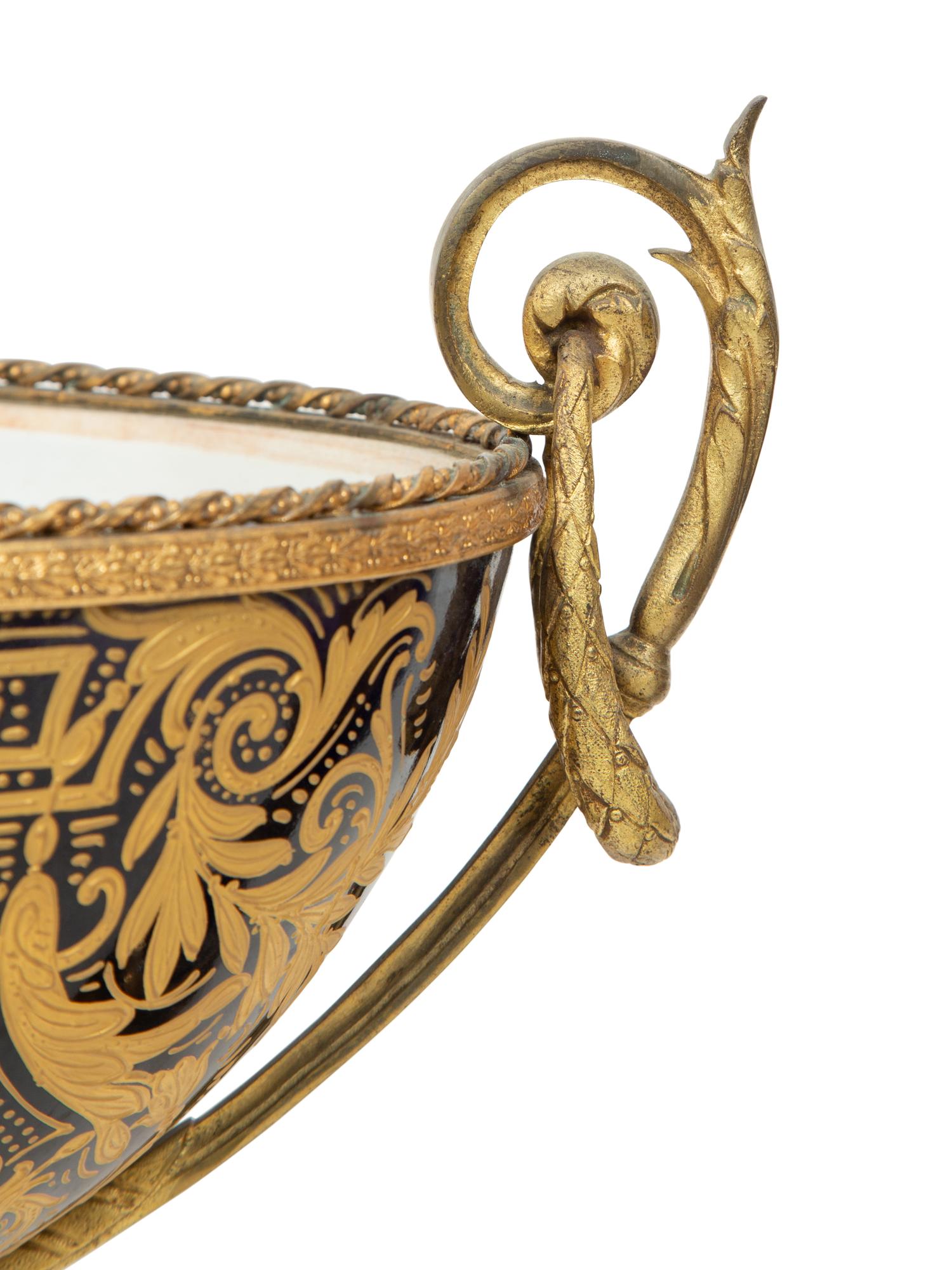 A Sèvres Style Gilt Metal Mounted Porcelain Garniture
