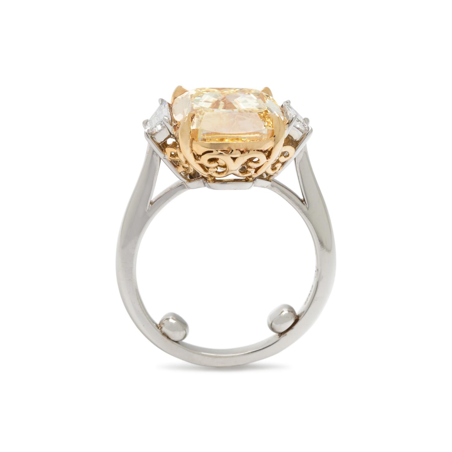 FOREVERMARK, FANCY YELLOW DIAMOND AND DIAMOND RING