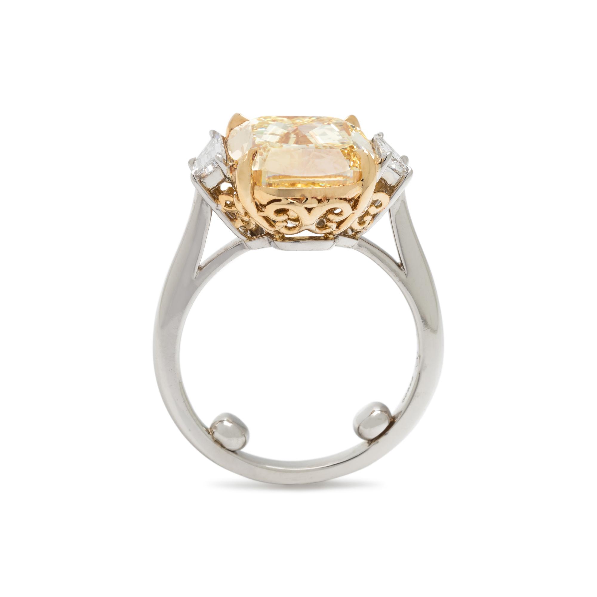 FOREVERMARK, FANCY YELLOW DIAMOND AND DIAMOND RING