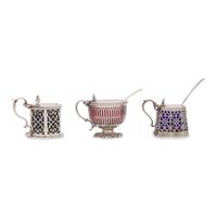 Three English Pierced Silver Mustard Pots and Two Silver Mustard Spoons