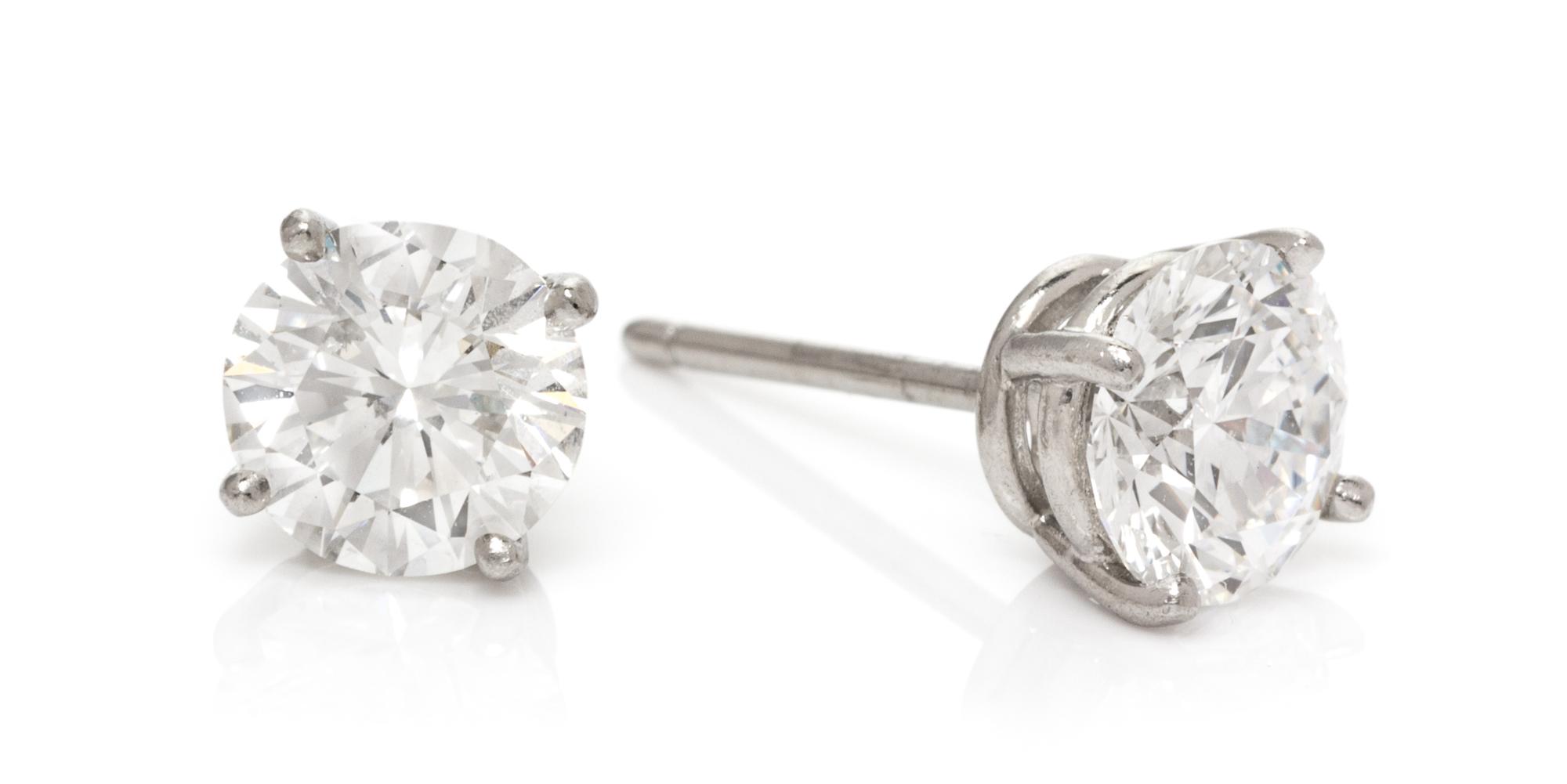 A Pair of Platinum and Diamond Studs, Tiffany & Co., 1.80 dwts.