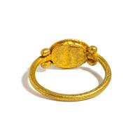 A Roman Gold and Garnet Finger Ring with the Goddess Minerva