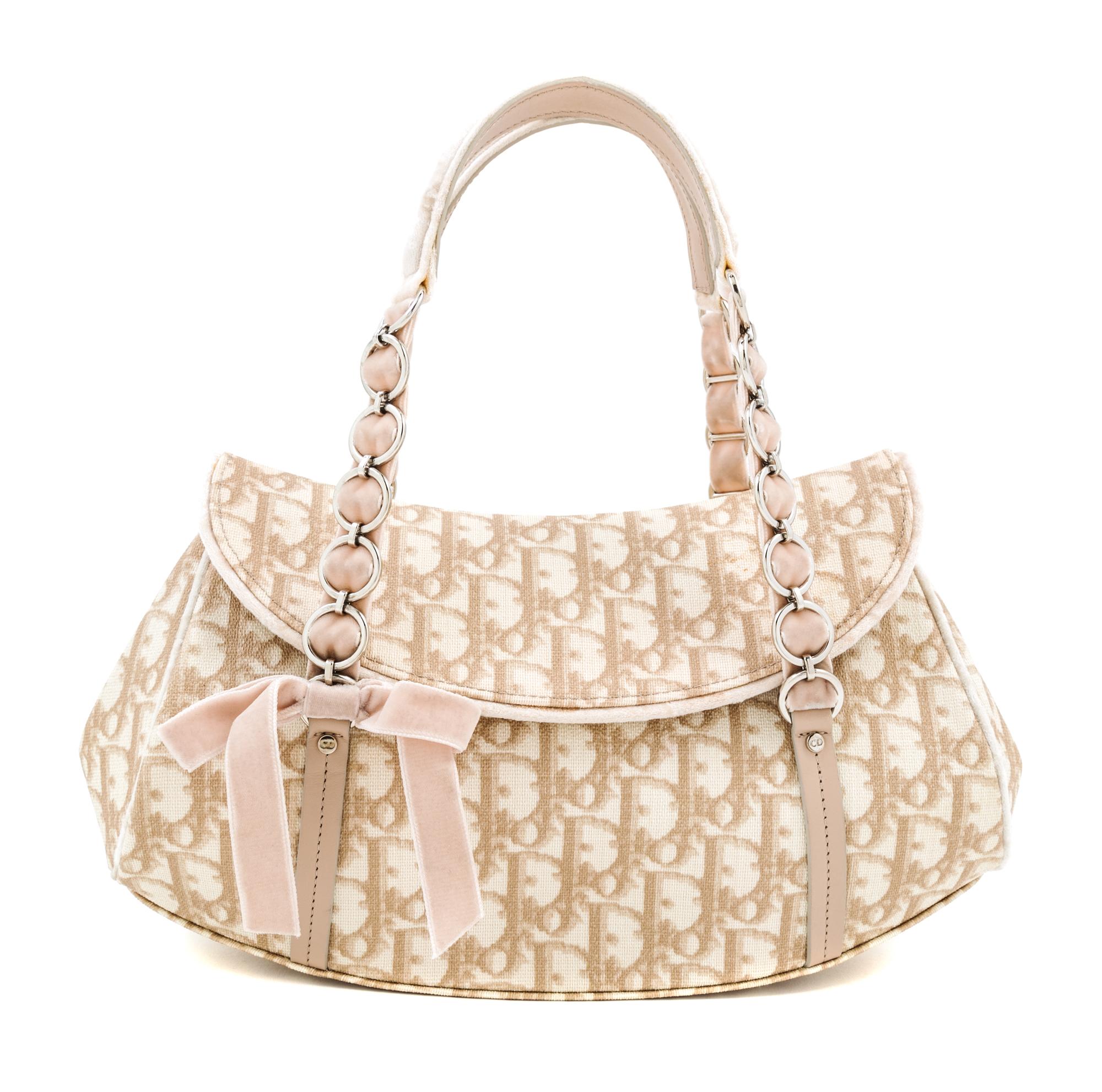 A Christian Dior Monogram Romantique Trotter Bag, 12" x 7" x 4"; Handle drop: 6".