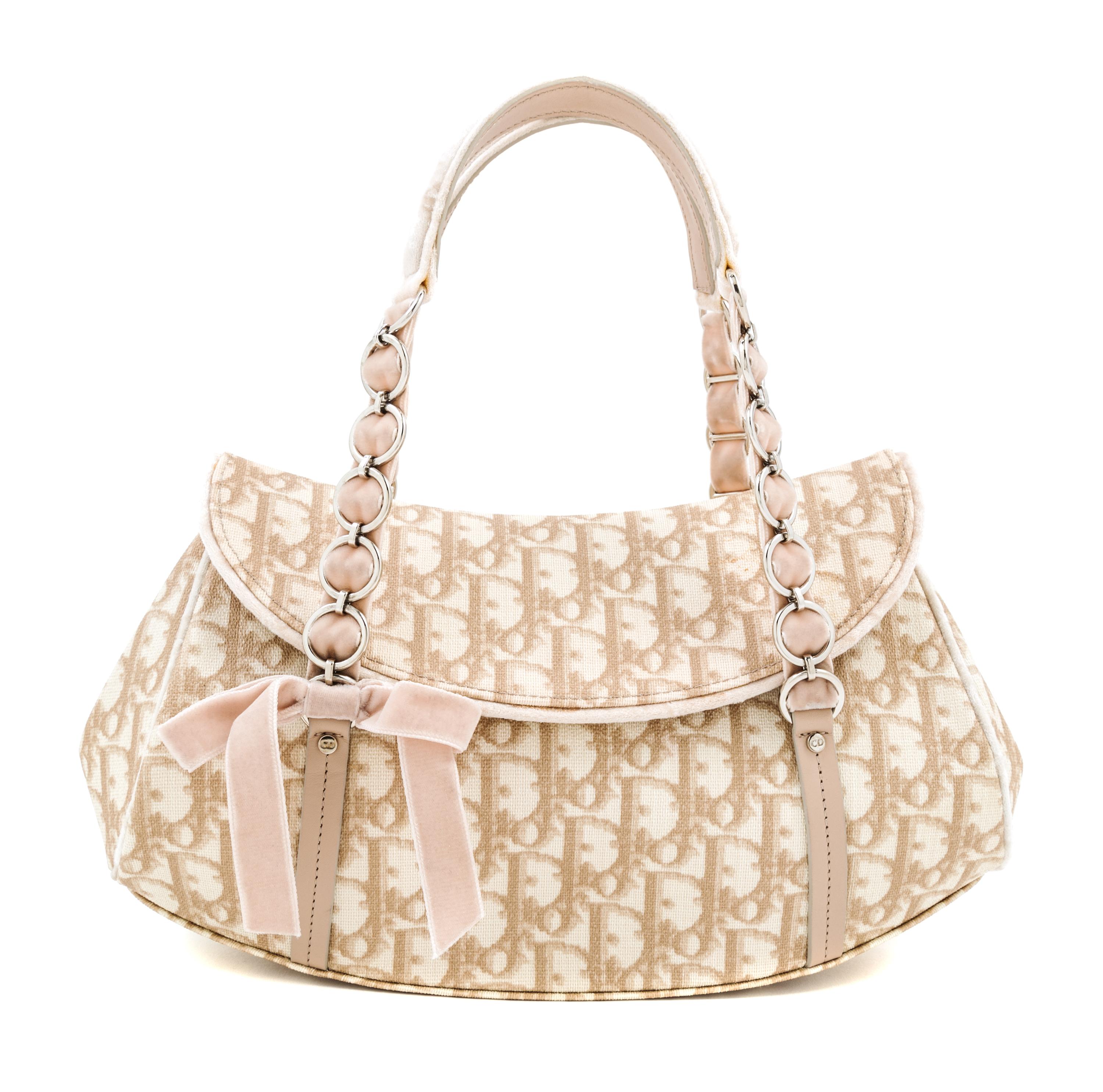 A Christian Dior Monogram Romantique Trotter Bag, 12" x 7" x 4"; Handle drop: 6".