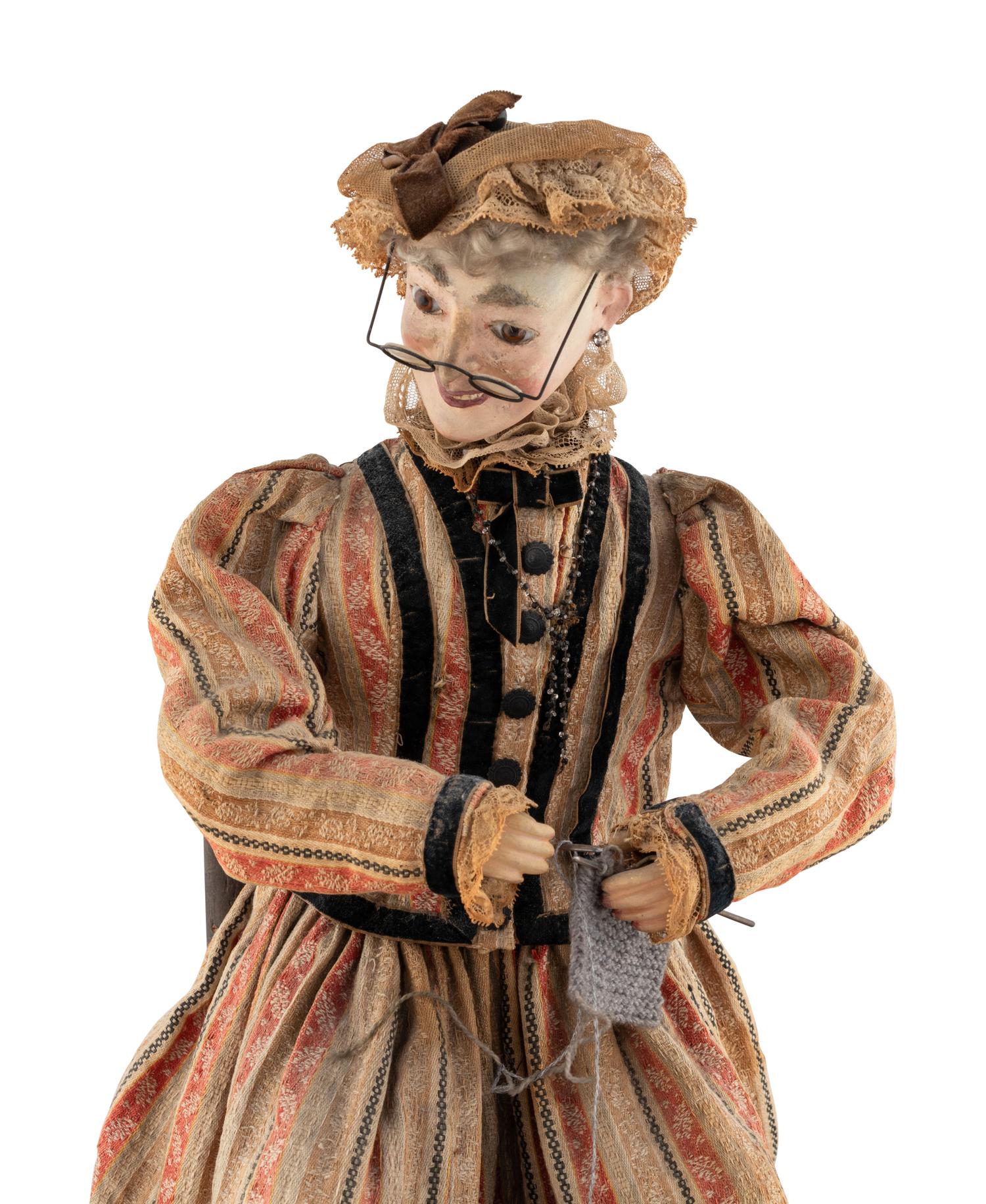 A Knitter Automaton on Base