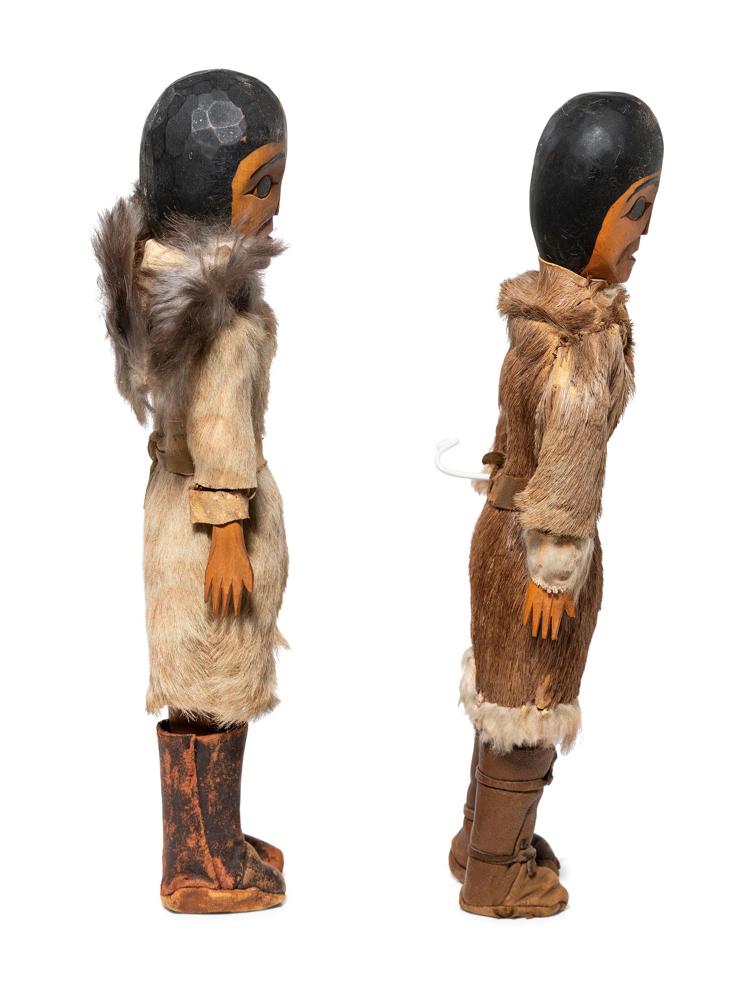 Pair of Haida Carved Wood Dolls