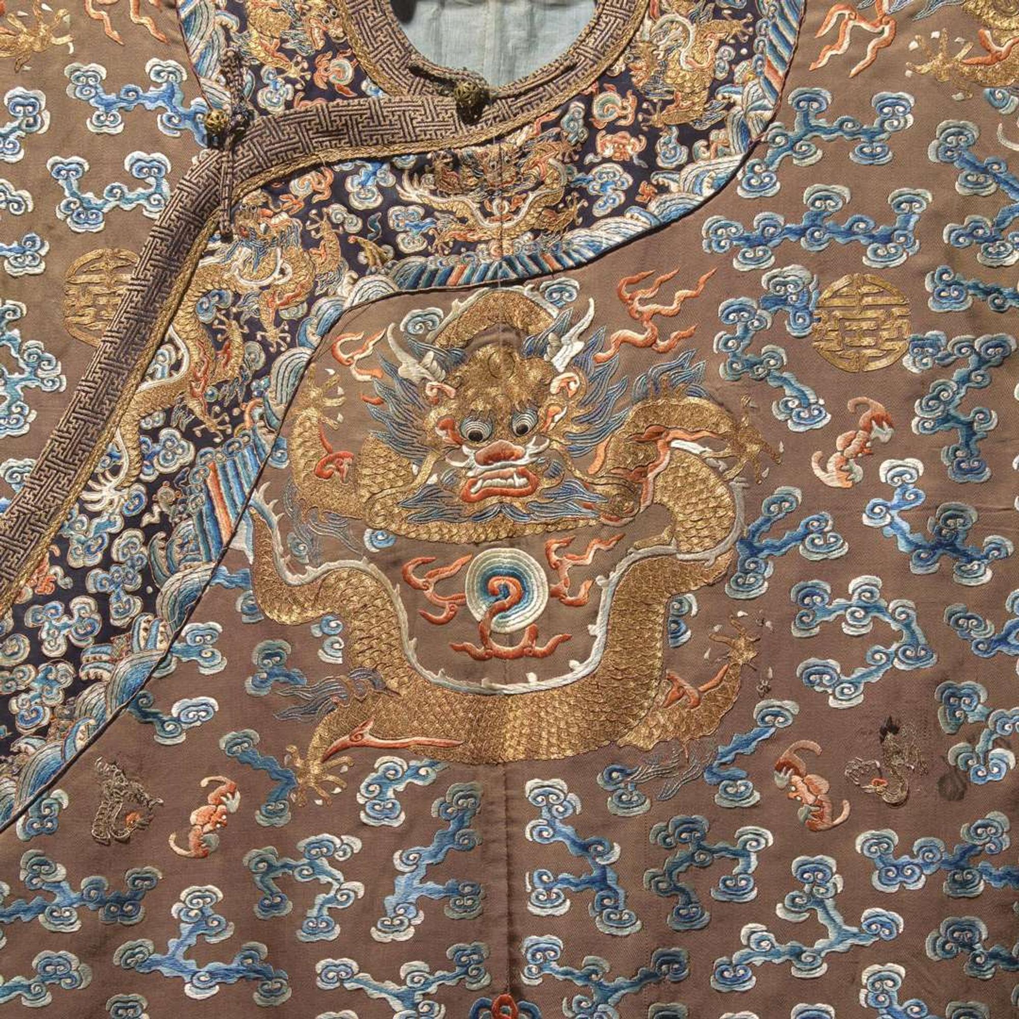 A Chinese embroidered brown silk “Dragon” court robe 刺绣龙袍 Qing dynasty, 19th century ? ????