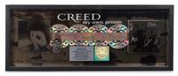 An Autographed Creed: My Own Prison RIAA Certified 4x Platinum Presentation Album 12 x 31 inches.