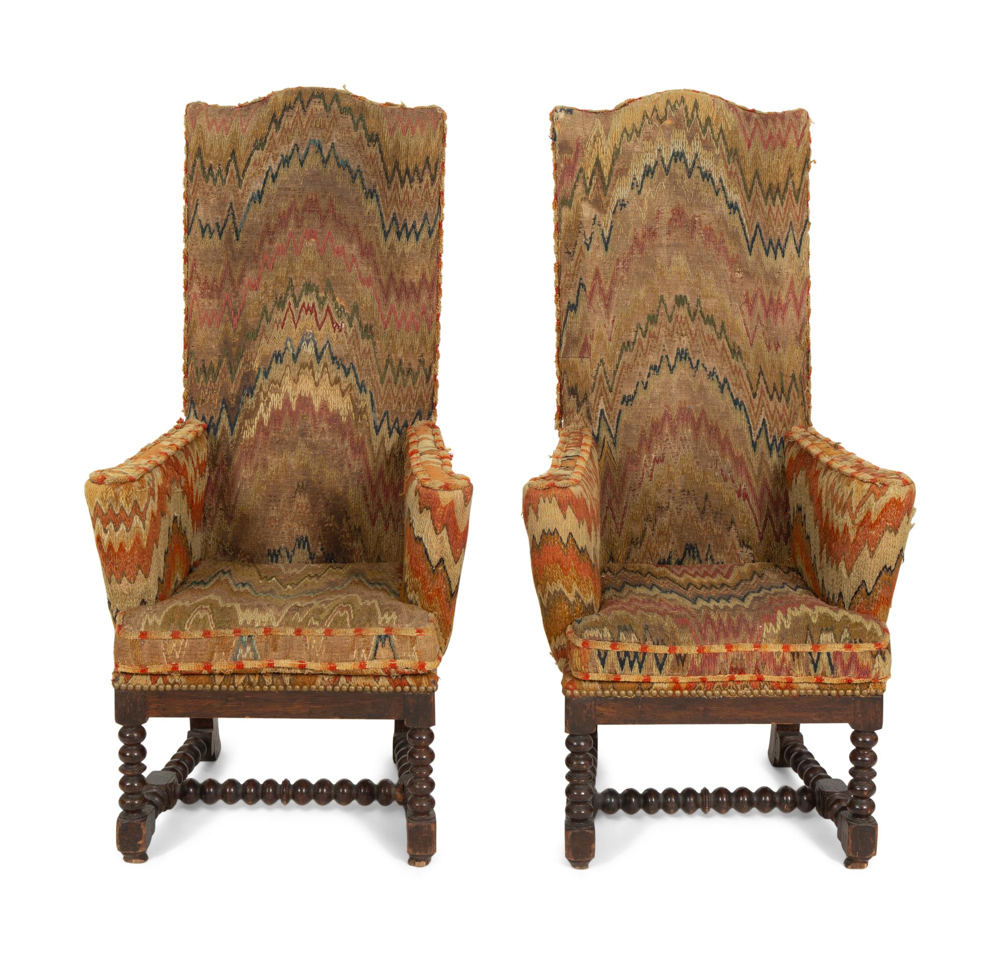 A Pair of Jacobean Style High Back Armchairs