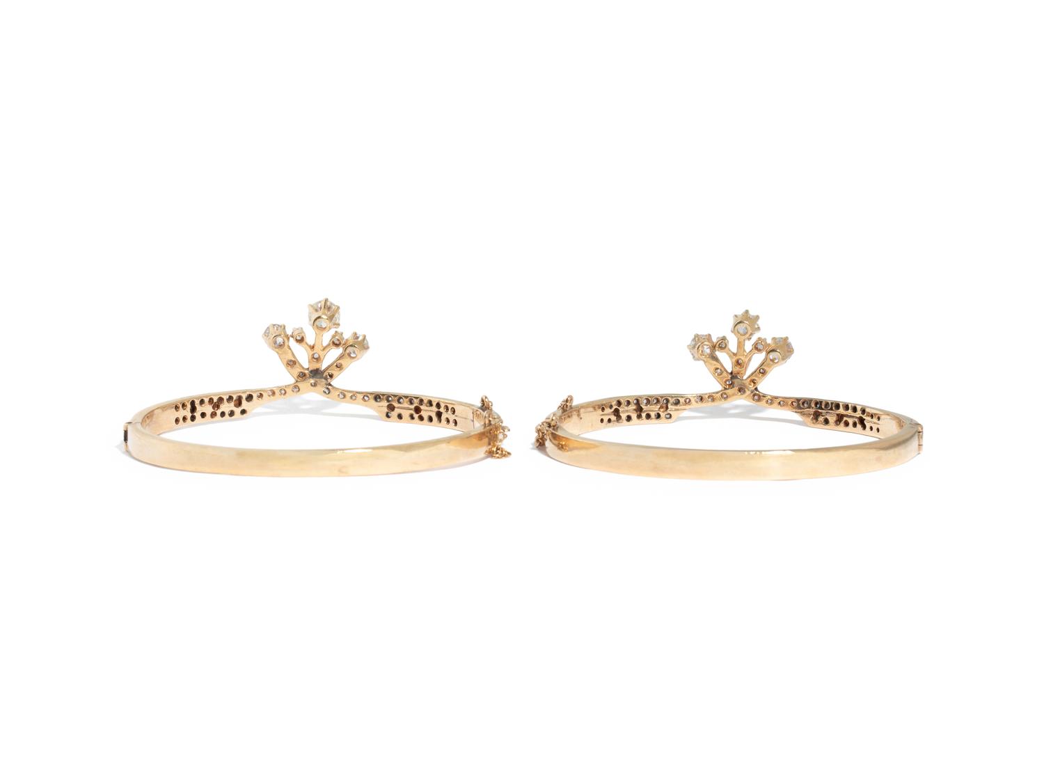 PAIR OF YELLOW GOLD AND DIAMOND BANGLE BRACELETS