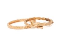 COLLECTION OF YELLOW GOLD BANGLE BRACELETS