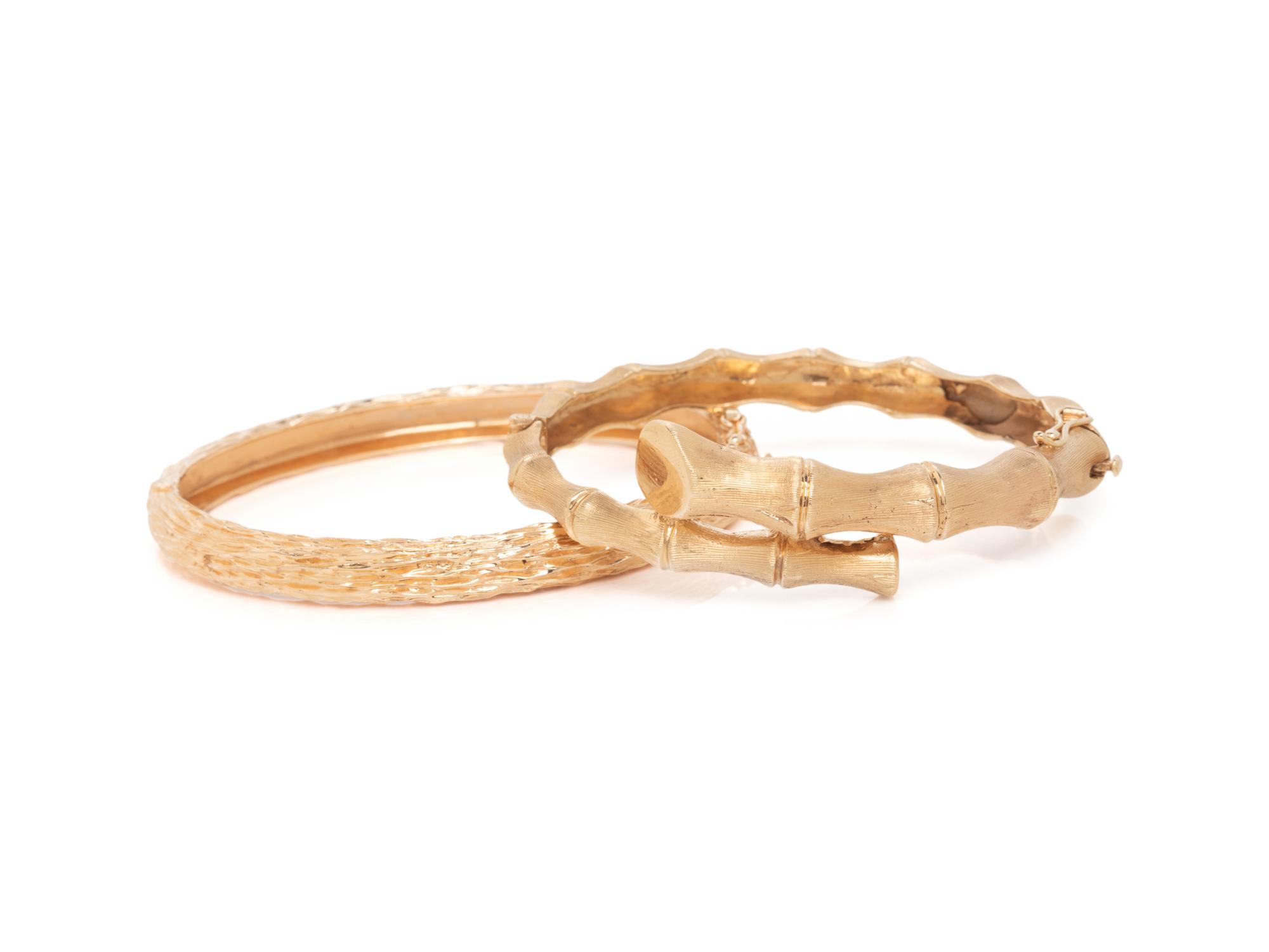 COLLECTION OF YELLOW GOLD BANGLE BRACELETS