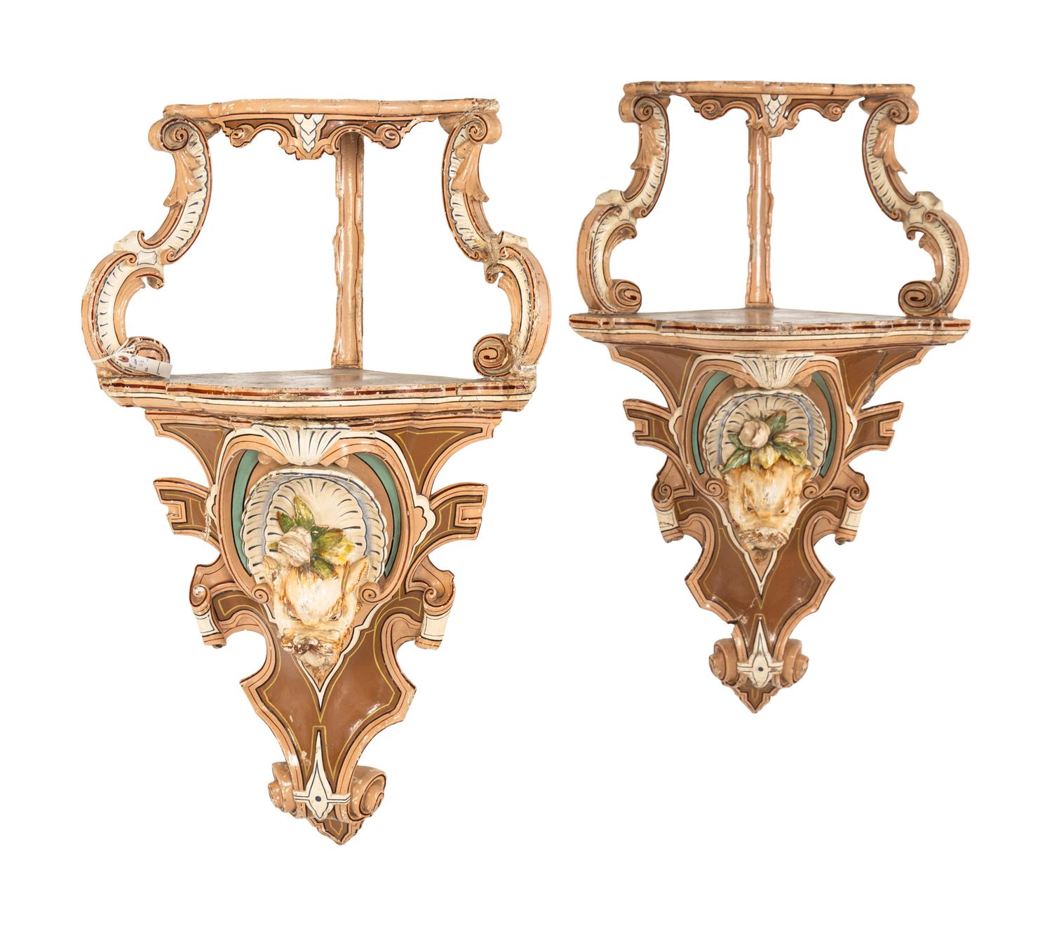 A Pair of Continental Carved and Painted Wood Wall Brackets