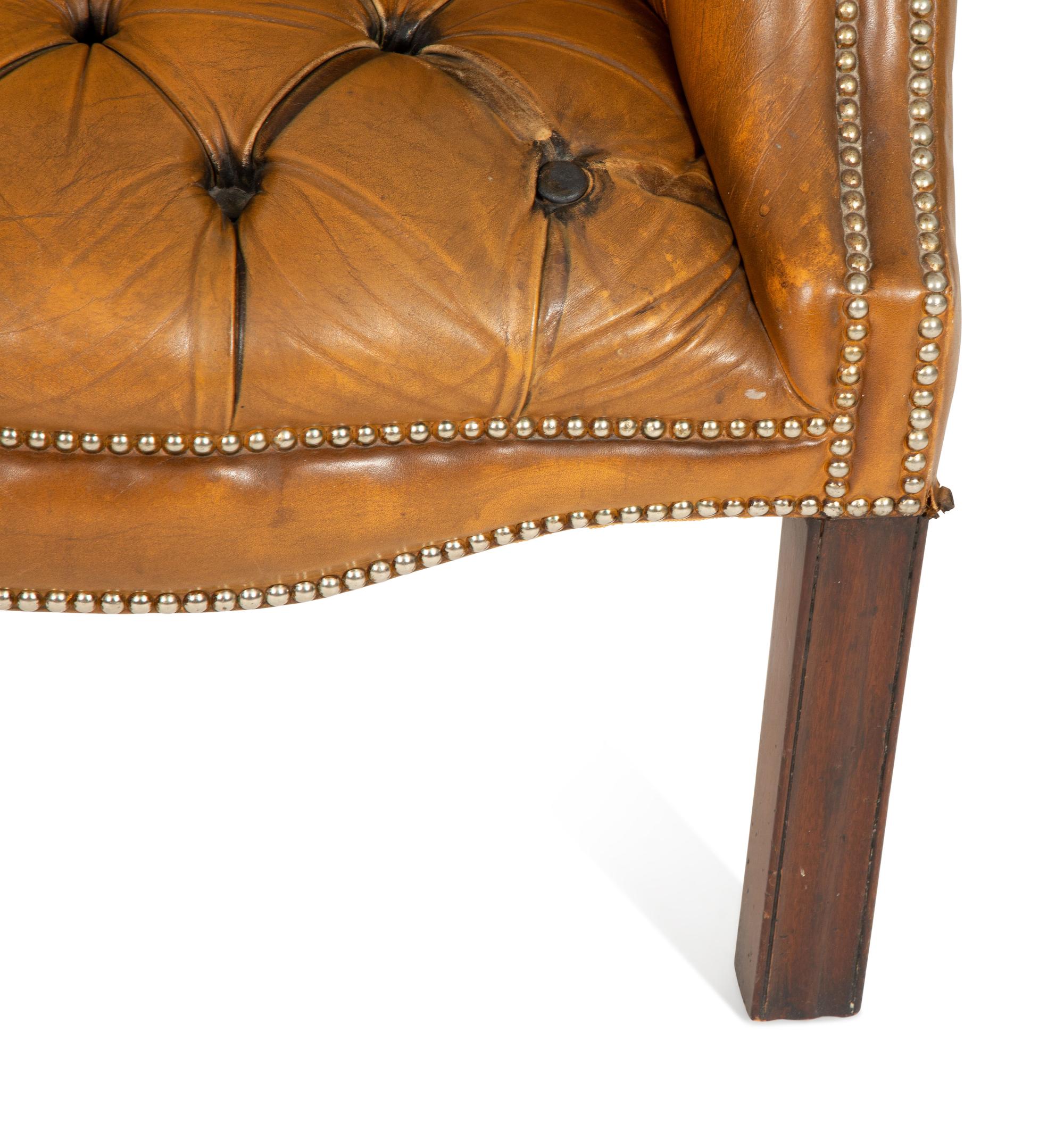 An English Button-Tufted Leather Armchair