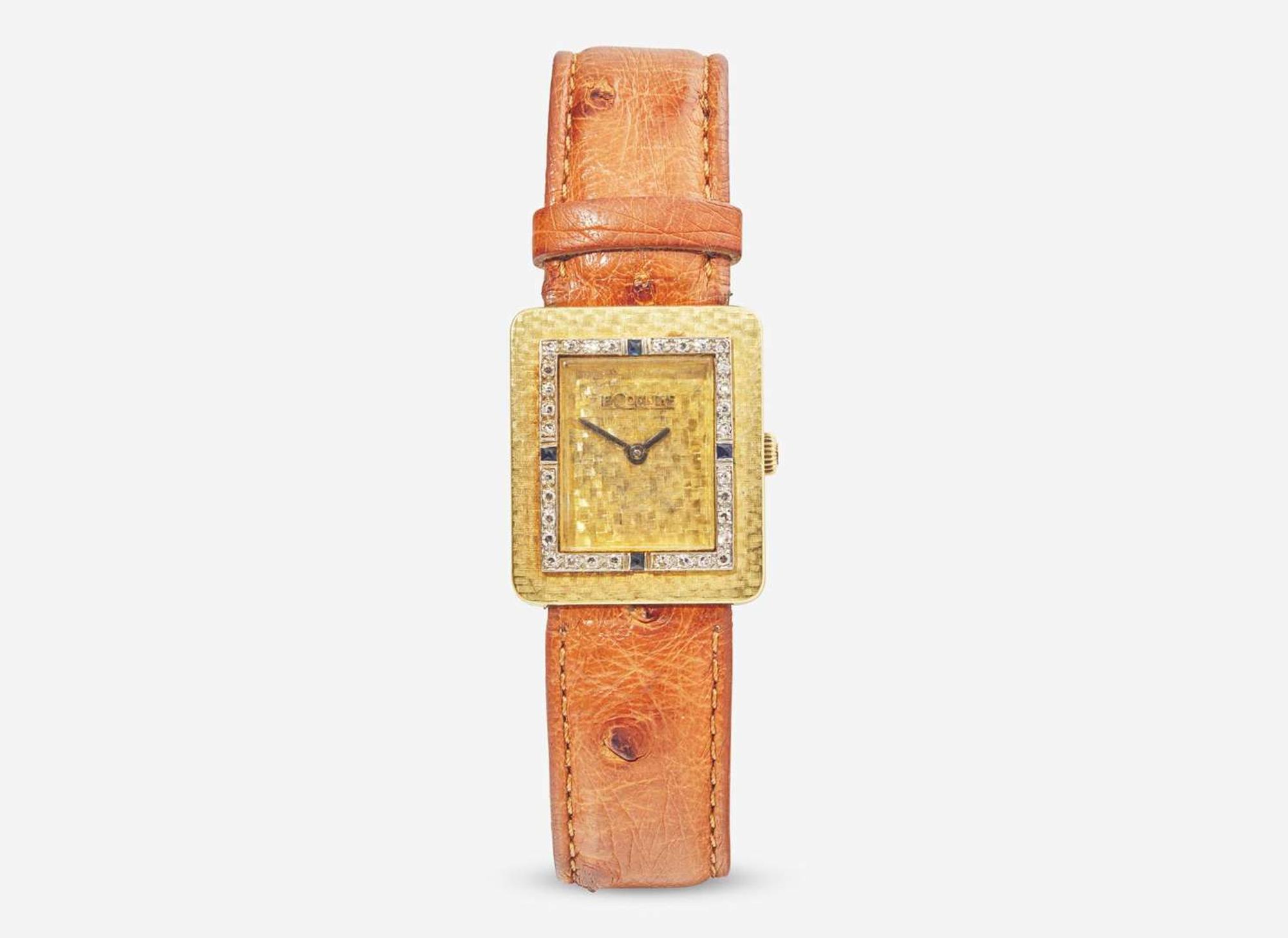 A Ladies 18K Yellow Gold and Diamond LeCoultre Watch