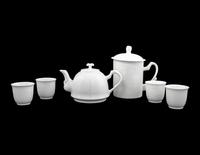 A Set of White Glazed Porcelain Teapot and Tea Cups and A Covered Mug