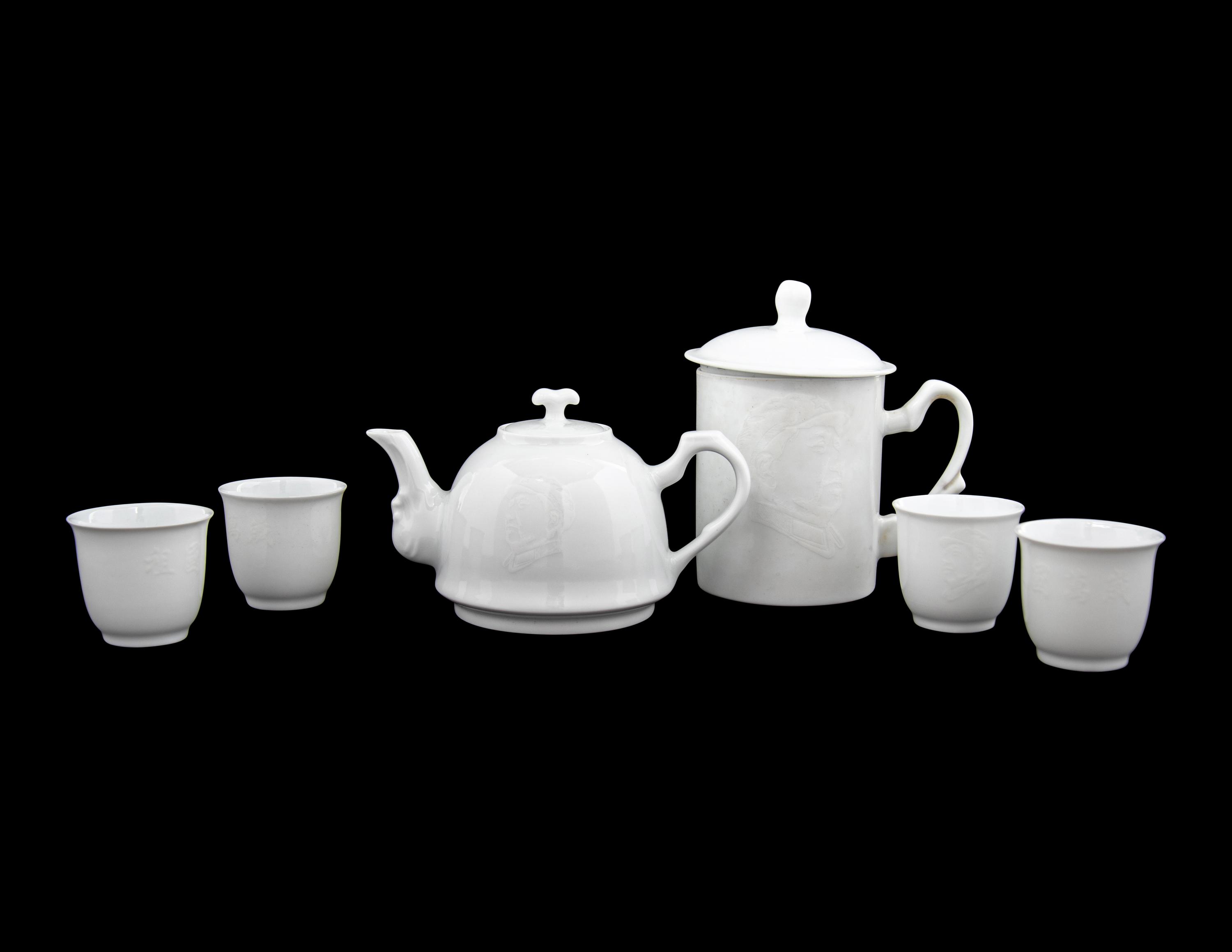 A Set of White Glazed Porcelain Teapot and Tea Cups and A Covered Mug