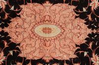 A Tabriz Wool Rug