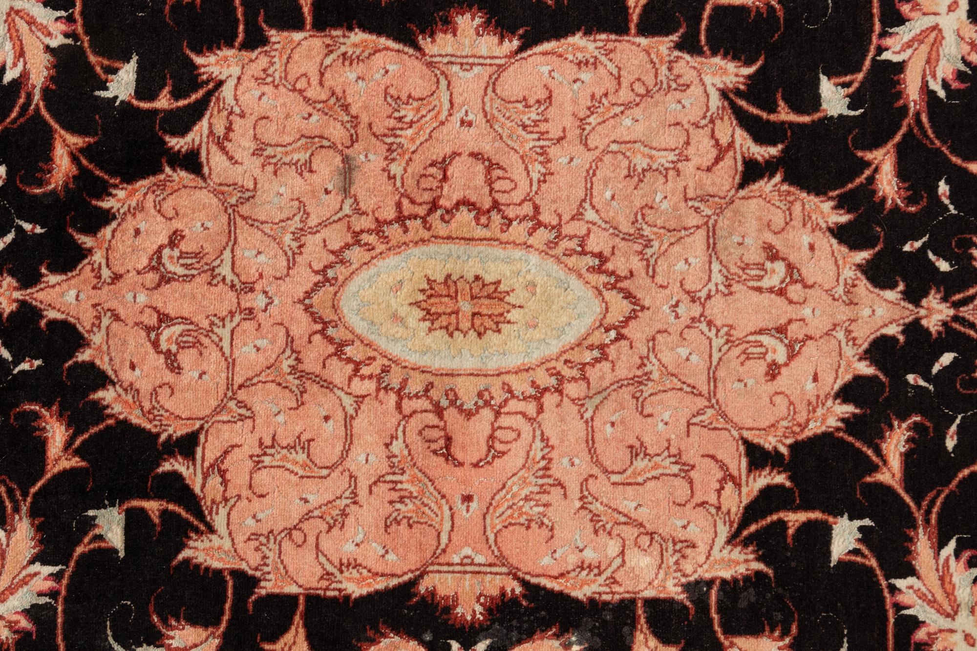 A Tabriz Wool Rug