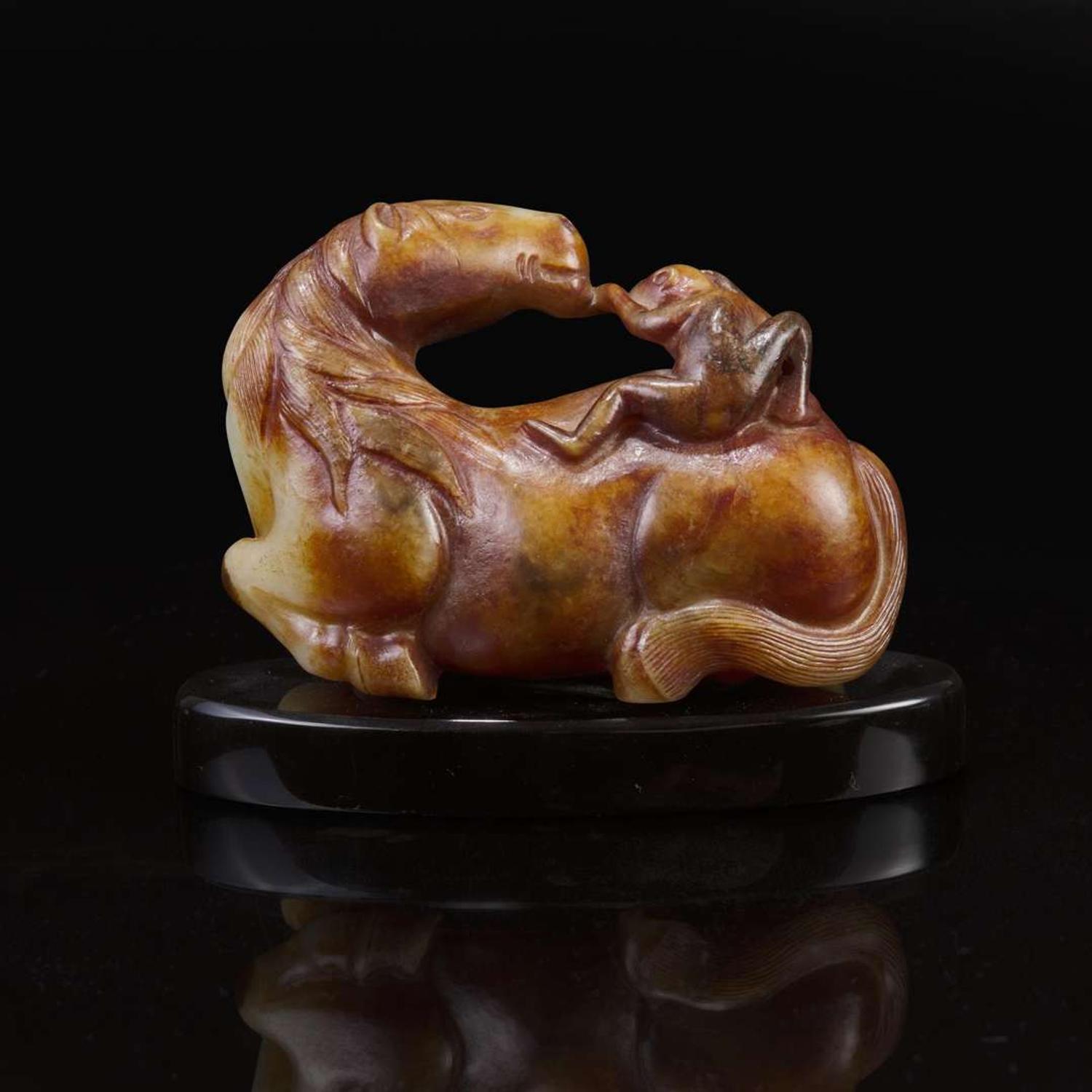 A Chinese yellowish and russet jade "Horse and Monkey" group 马上封”猴“玉雕 18th century or later ???????