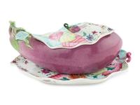 A Chinese Export "Tobacco Leaf" Porcelain Eggplant-Form Sauce Tureen and Underplate