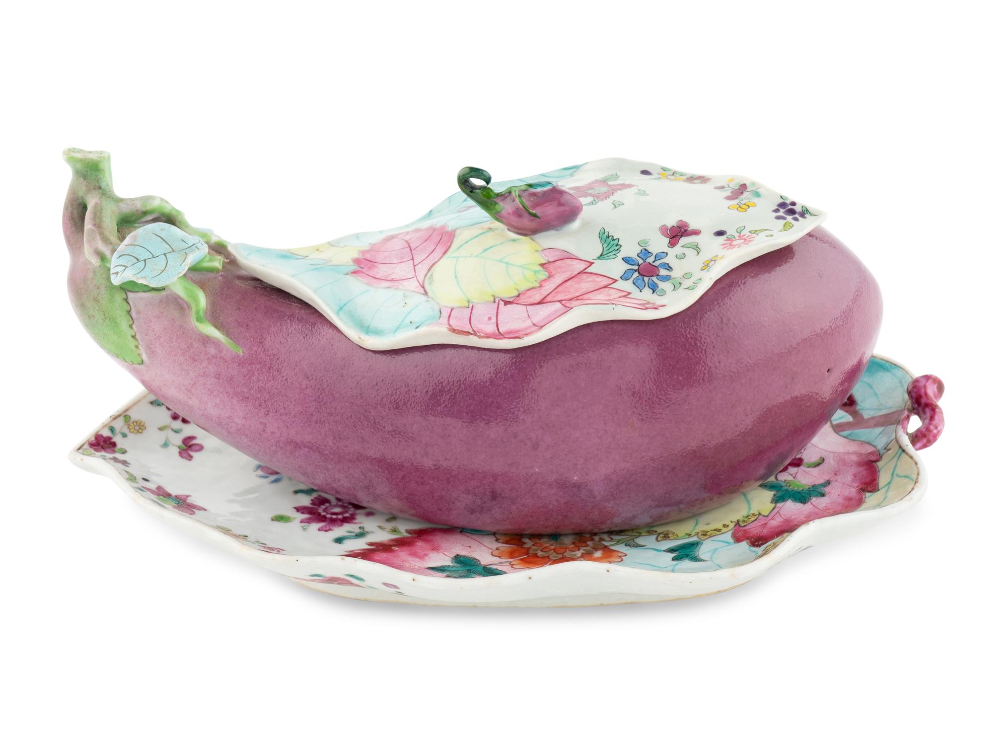 A Chinese Export "Tobacco Leaf" Porcelain Eggplant-Form Sauce Tureen and Underplate
