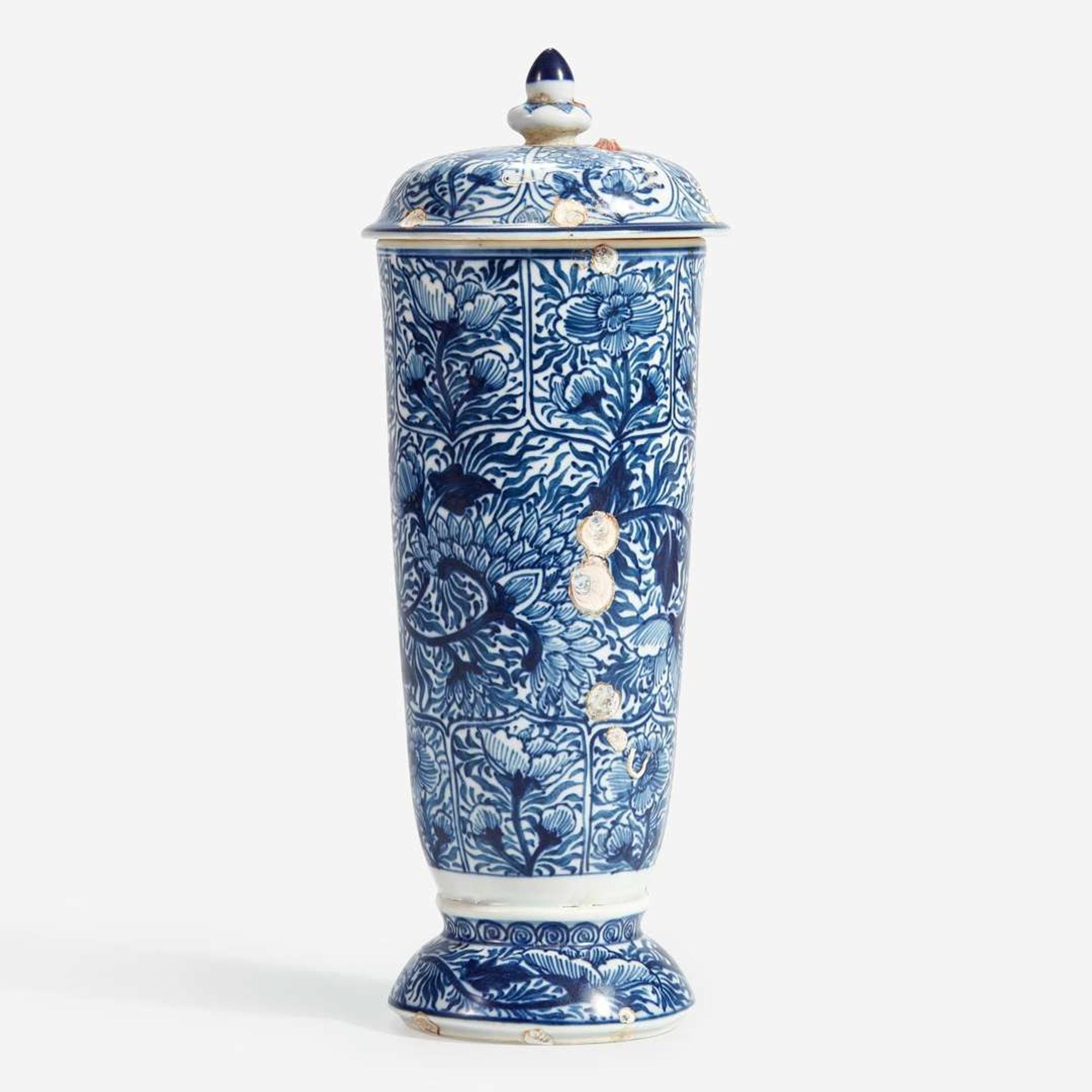 A Chinese blue and white porcelain beaker vase and cover Kangxi period