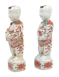 A Pair of Chinese Export Porcelain Models of Standing Boys
