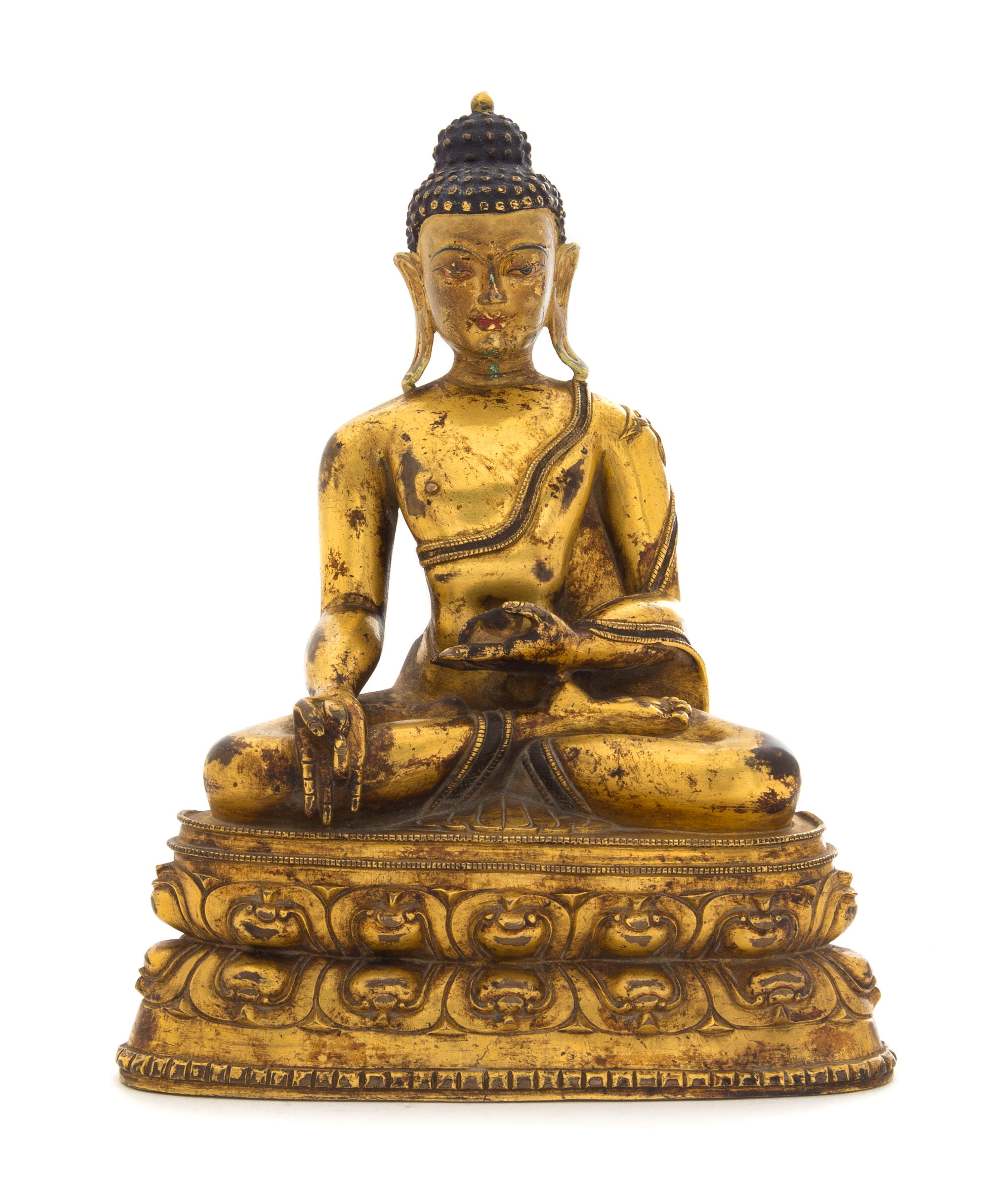 A Sino-Tibetan Gilt Bronze Figure of Medicine Buddha Height 9 1/2 inches. — 18TH/19TH CENTURY