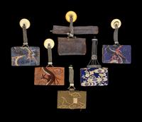 Six Japanese Leather and Clocth Tobacco Purses
