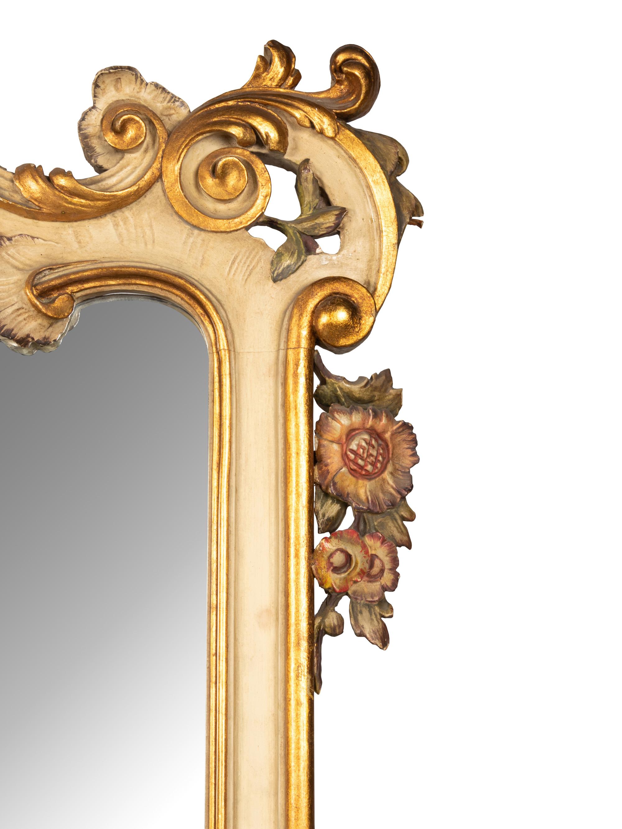 A Large Italian Painted and Parcel Gilt Mirror
