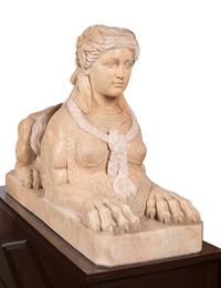 A Pair of Large Composite Marble Sphinxes