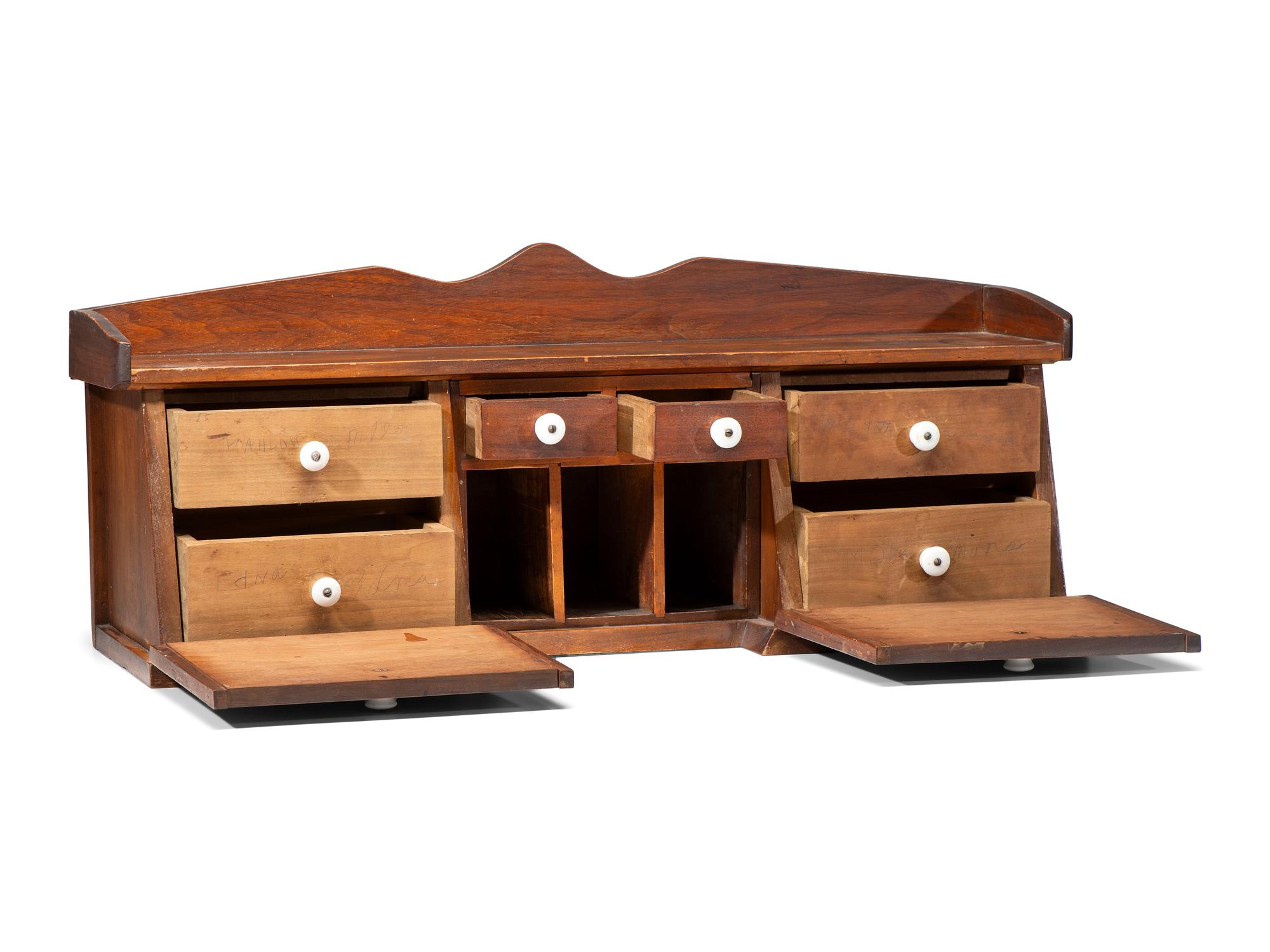 A Late Classical Parcel Gilt Desk Cupboard
