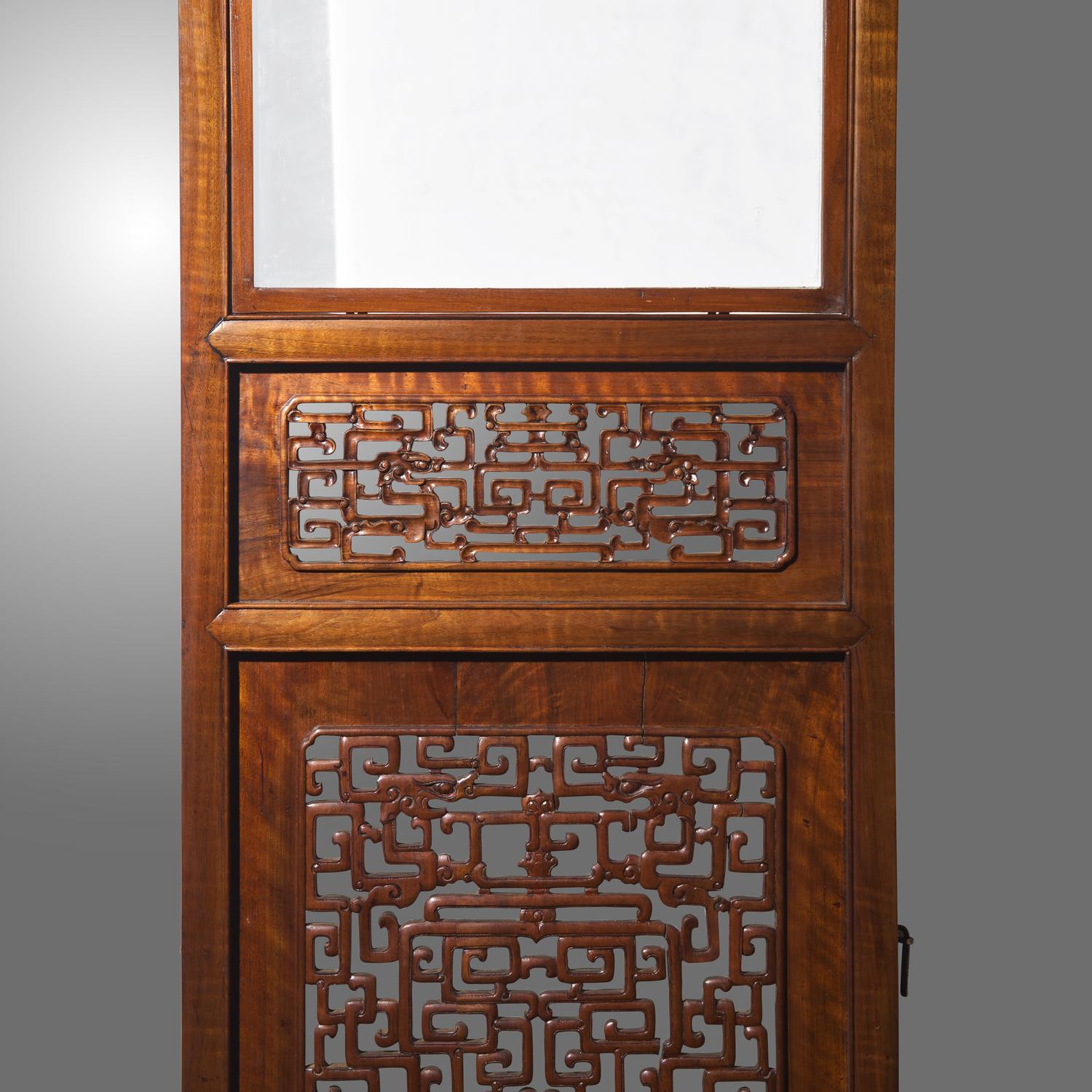 A Large Chinese Carved Hardwood, Possibly Longyan Mu, and Glass Eight-Panel Screen 或為龍眼木嵌玻璃透雕夔龍紋八扇屏