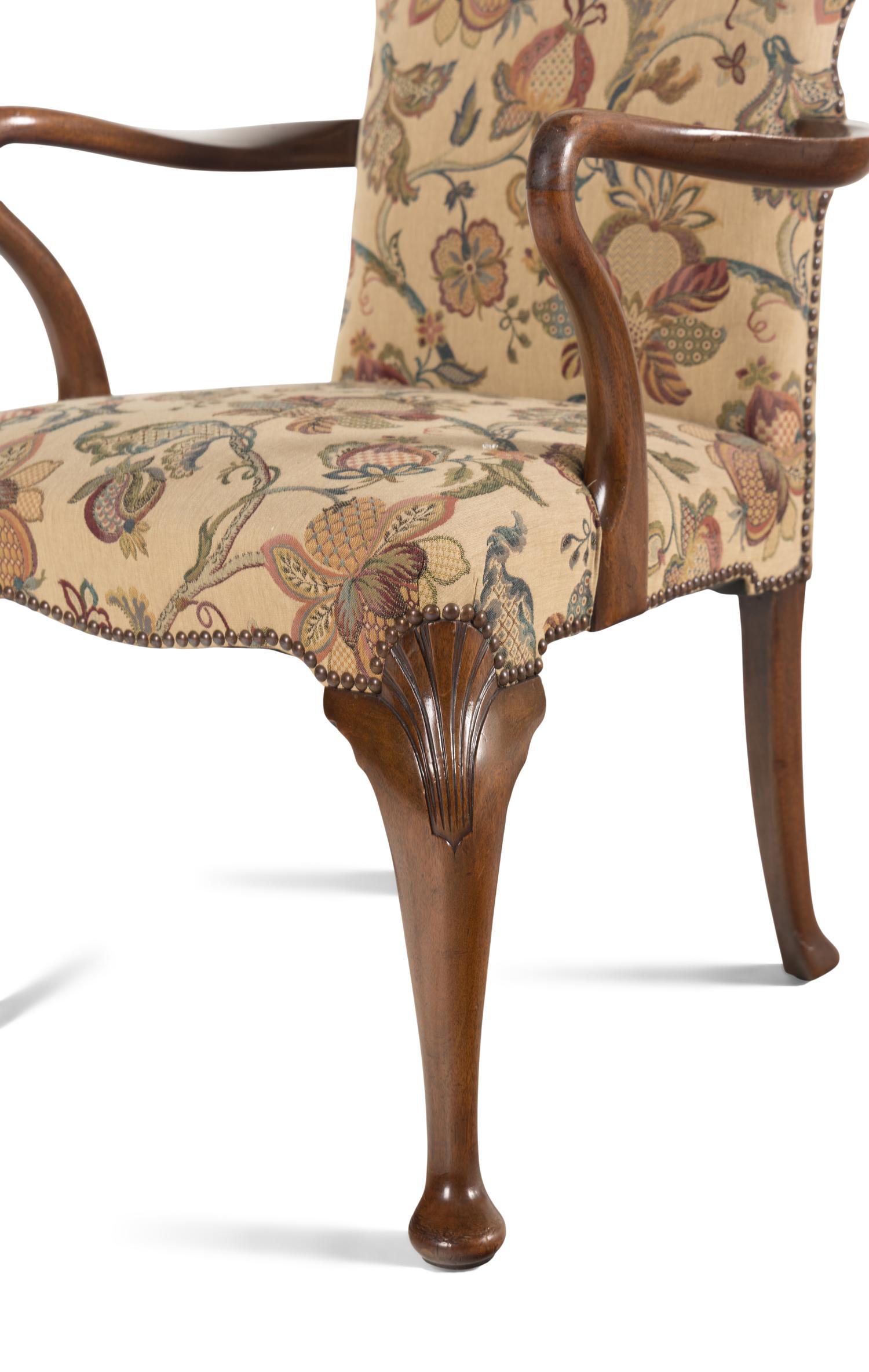 A Set of Four Queen Anne Style Walnut Armchairs
